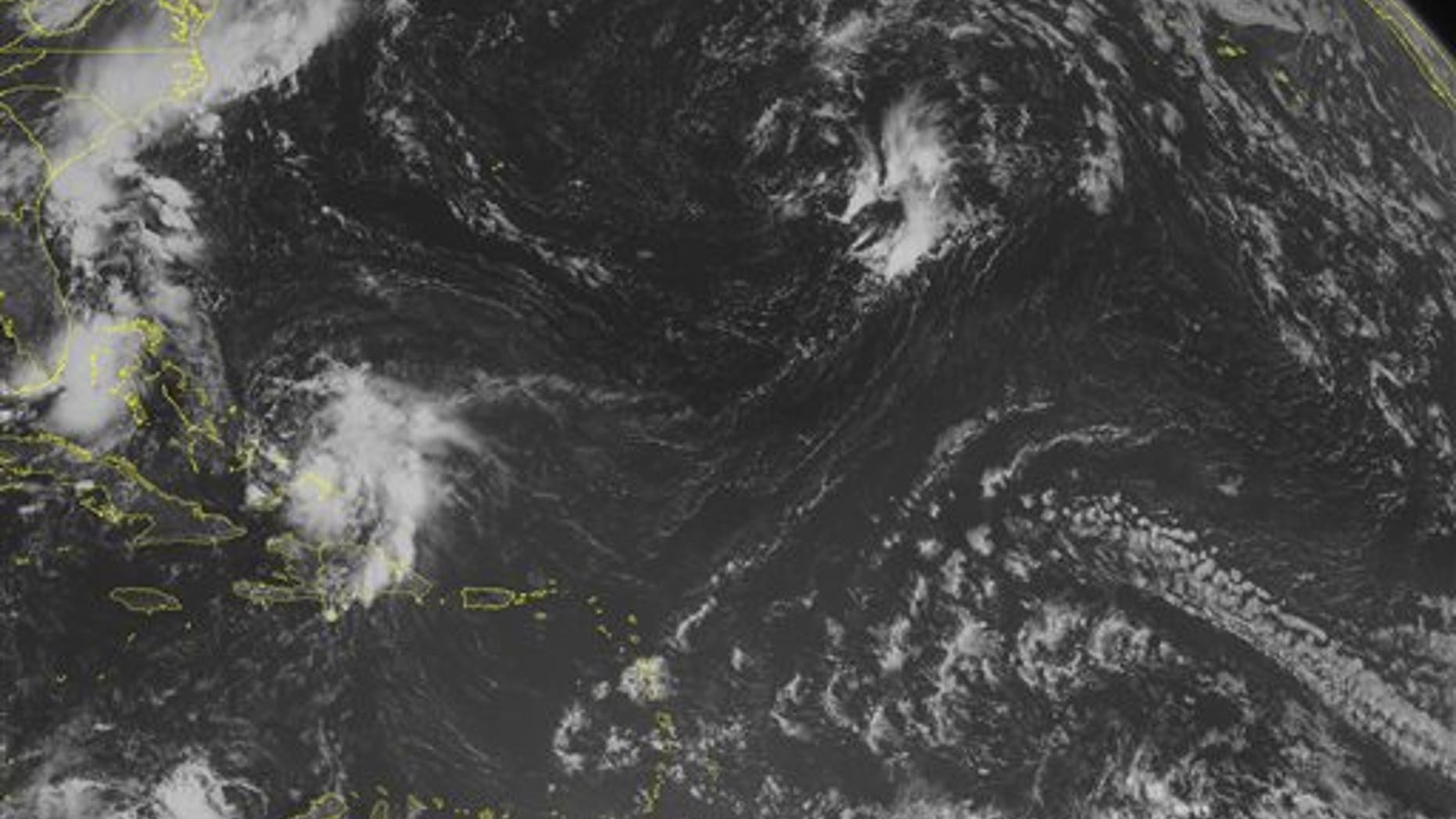 This NOAA satellite image taken Sunday, August 03, 2014 at 10:45 AM EDT shows Tropical Storm Bertha now moving towards the Bahamas. The storm is about 150 miles south of San Salvador. The winds are sustained at 45 MPH and is moving NW at 18 MPH. The central pressure is 1012 is expected remain the sane intensity. (AP PHOTO/WEATHER UNDERGROUND)