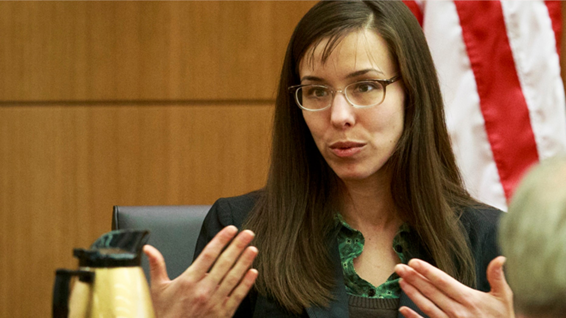 Feb. 6, 2013: Defendant Jodi Arias describes her relationship with Travis Alexander and answers questions from her attorney Kirk Nurmi as she testifies in her murder trial in Judge Sherry Stephens' Superior Court. Arias, 32, is accused of stabbing and slashing Alexander, 27 times, slitting his throat and shooting him in the head in his suburban Phoenix home in June 2008. She initially denied any involvement, then later blamed it on masked intruders before eventually settling on self-defense. (AP)