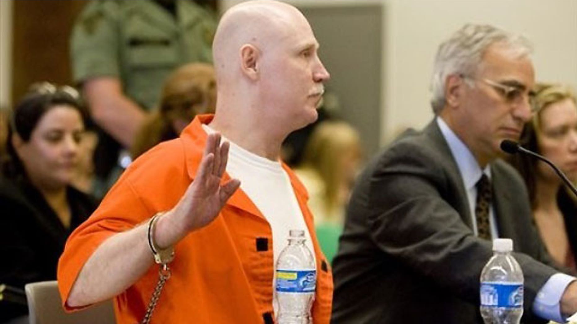 June 10: Ronnie Lee Gardner is sworn in before speaking at his commutation hearing at the Utah State Prison in Draper, Utah.