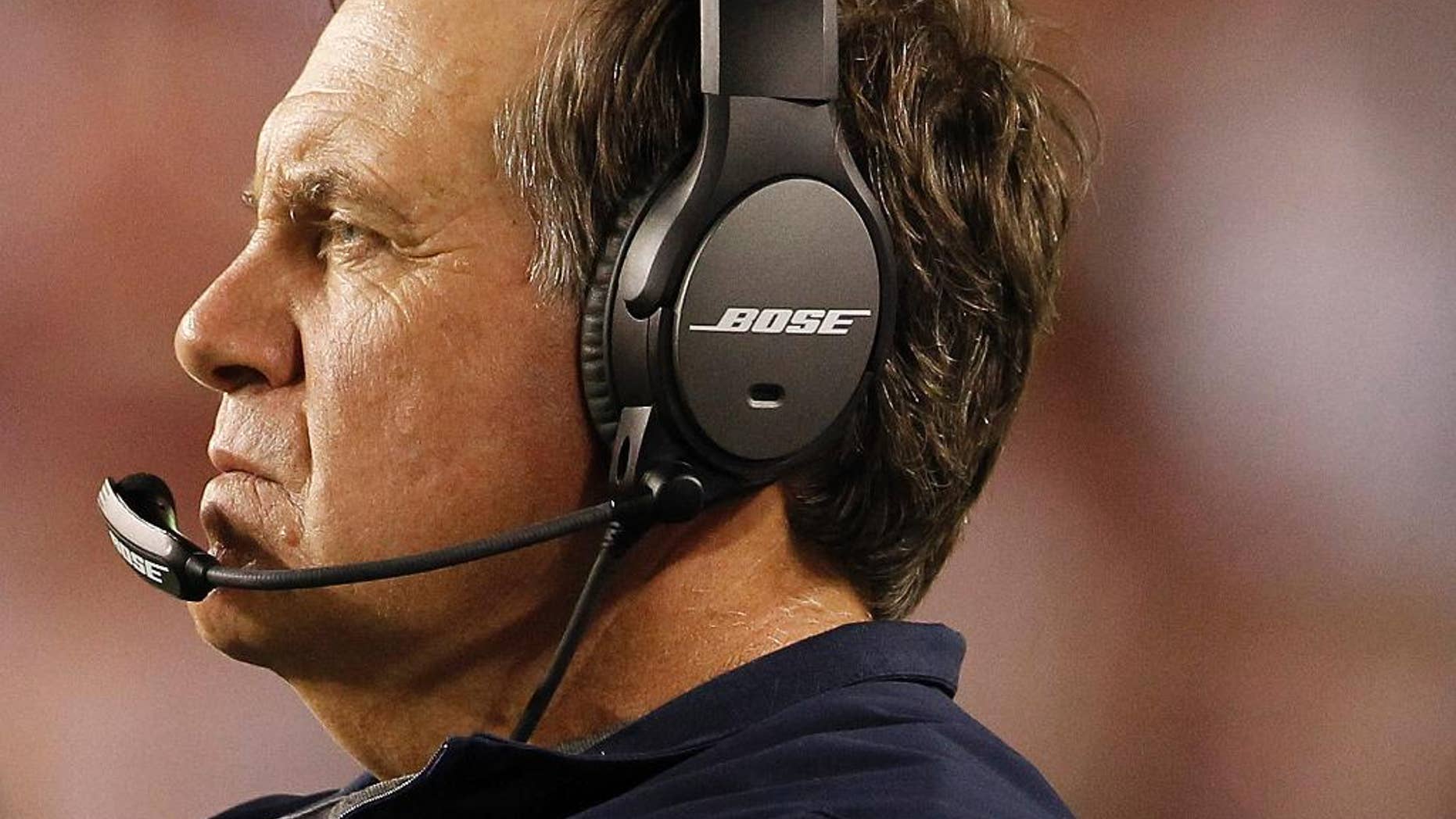 New England Patriots coach Bill Belichick during the second half of teh Patriots' NFL football preseason game against the Washington Redskins in Landover, Md., Thursday, Aug. 7, 2014. (AP Photo/Connor Radnovich)