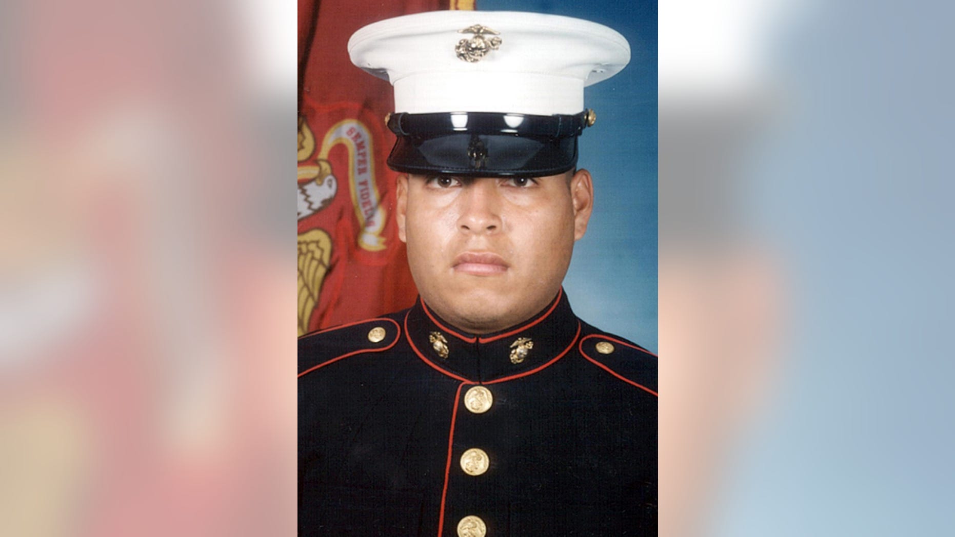 This undated file photo provided by the U.S. Navy shows Marine Sgt. Rafael Peralta.