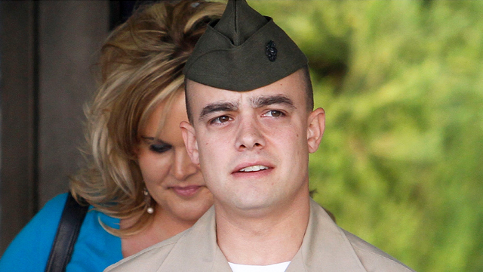 FILE - In this March 22, 2010 file photo, Marine Corps Staff Sgt. Frank Wuterich arrives for a pretrial hearing at Camp Pendleton Marine Corps Base in San Diego County, Calif.