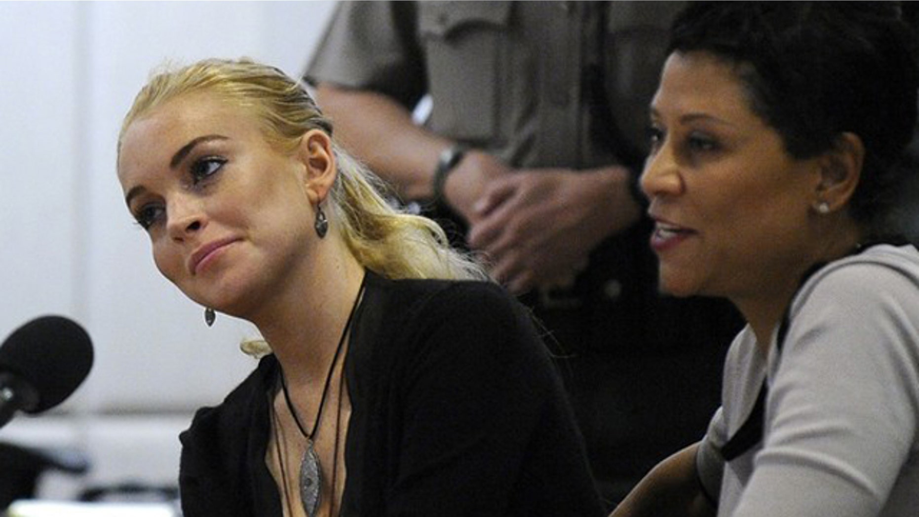 Feb. 23, 2011: Actress Lindsay Lohan and her attorney attend a preliminary hearing at the Airport Branch Courthouse in Los Angeles.