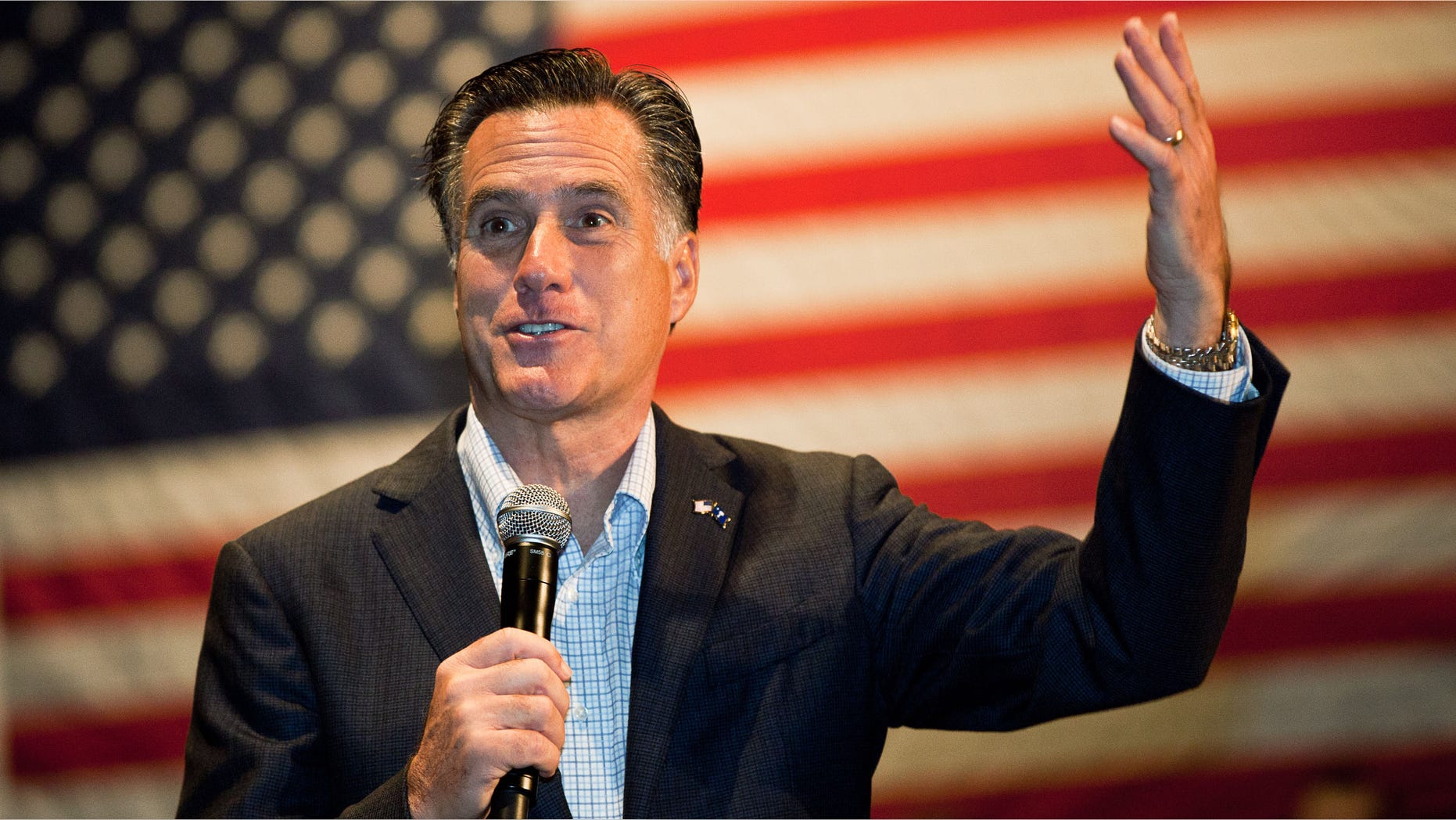 CHARLESTON, SC - DECEMBER 17: Republican presidential candidate former Massachusetts Gov. Mitt Romney speaks during a town hall meeting at the Memminger Auditorium on December 17, 2011 in Charleston, South Carolina. Romney is attempting to boost the momentum of his campaign following the conservative endorsement of South Carolina Gov. Nikki Haley. (Photo by Richard Ellis/Getty Images)