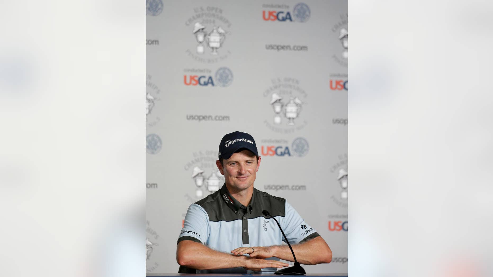 Justin Rose, of England, talks during a news conference for the U.S. Open golf tournament in Pinehurst, N.C., Tuesday, June 10, 2014. The tournament starts Thursday. (AP Photo/Eric Gay)