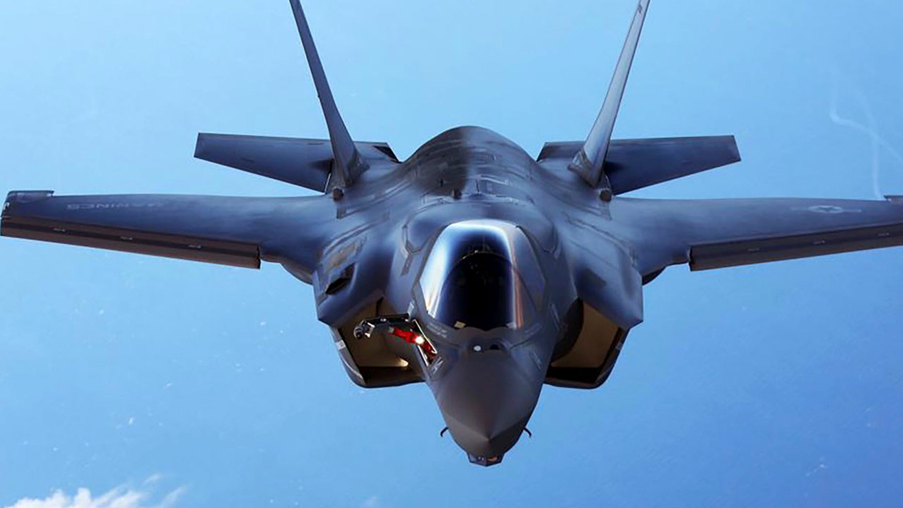 FILE: A U.S.Marine Corps F-35B joint strike fighter jet conducts aerial maneuvers during aerial refueling training over the Atlantic Ocean.