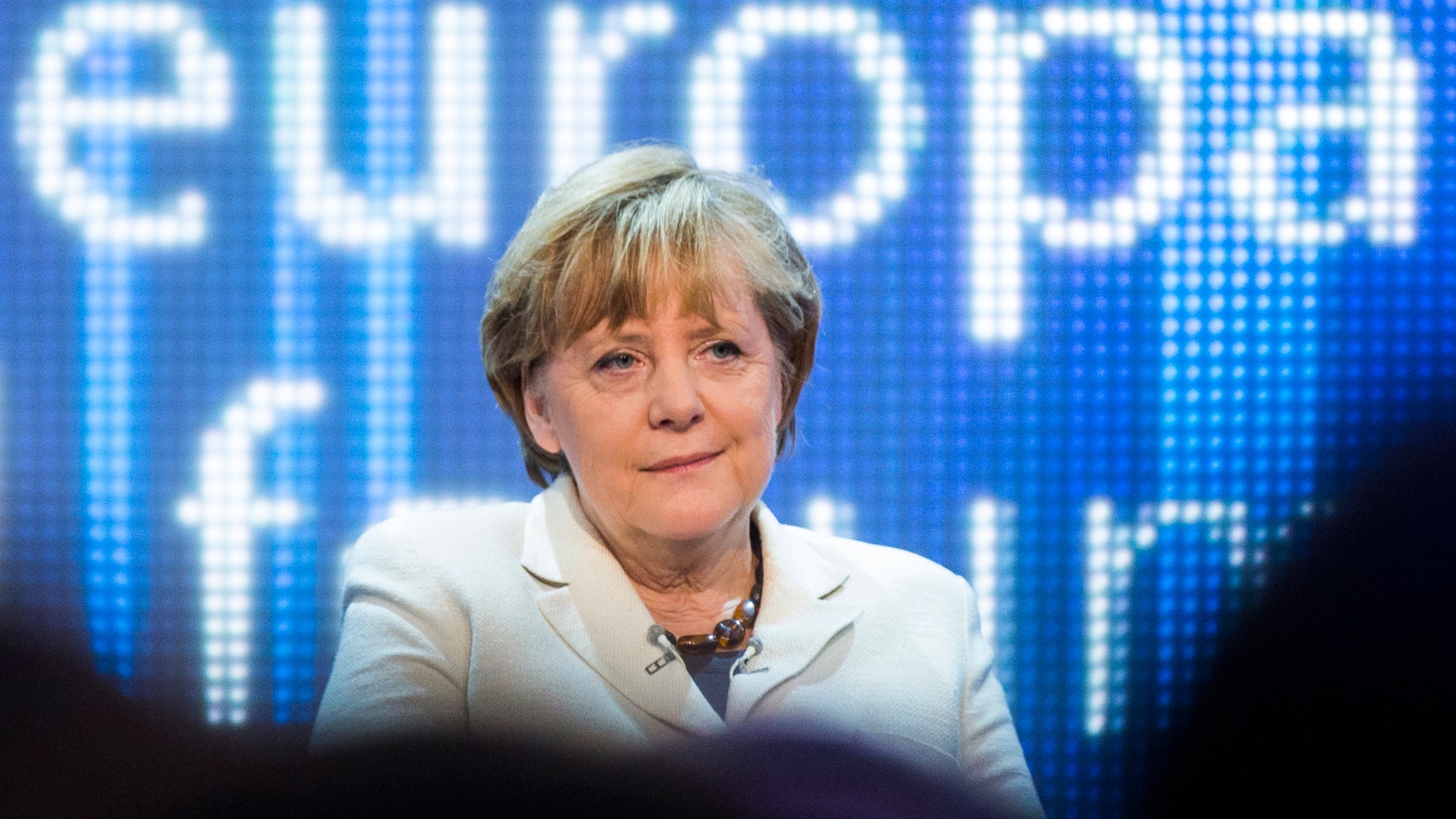 German Chancellor Angela Merkel attends a discussion panel on "making Europe strong" during the Europe forum conference, organized by German public-broadcaster WDR, in Berlin, Germany, Thursday, May 16, 2013. (AP Photo/Gero Breloer)