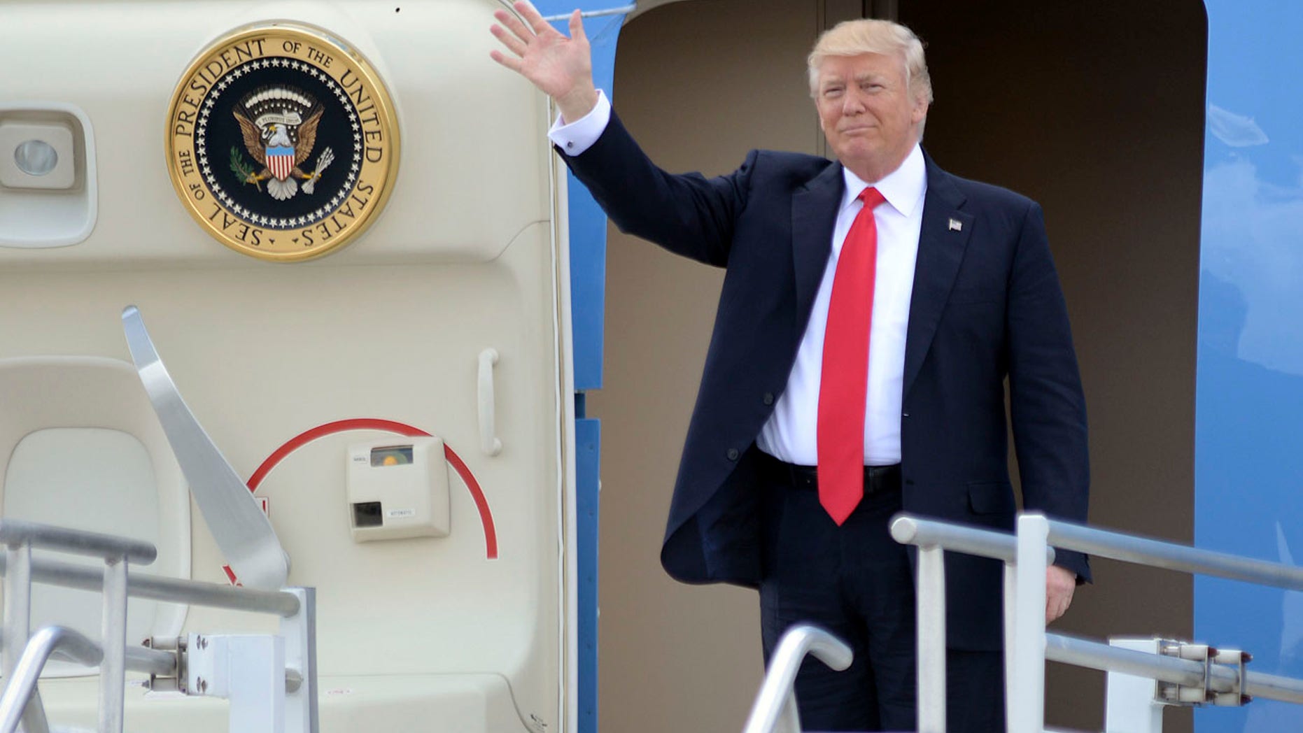 File photo: President Donald Trump arrives at Hartsfield Jackson International Airport, aboard Air Force One, Friday April 28, 2017, for a speech to the National Rifle Association's convention and a fundraiser for 6th District candidate Karen Handel. (Kent D. Johnson/Atlanta Journal-Constitution via AP)