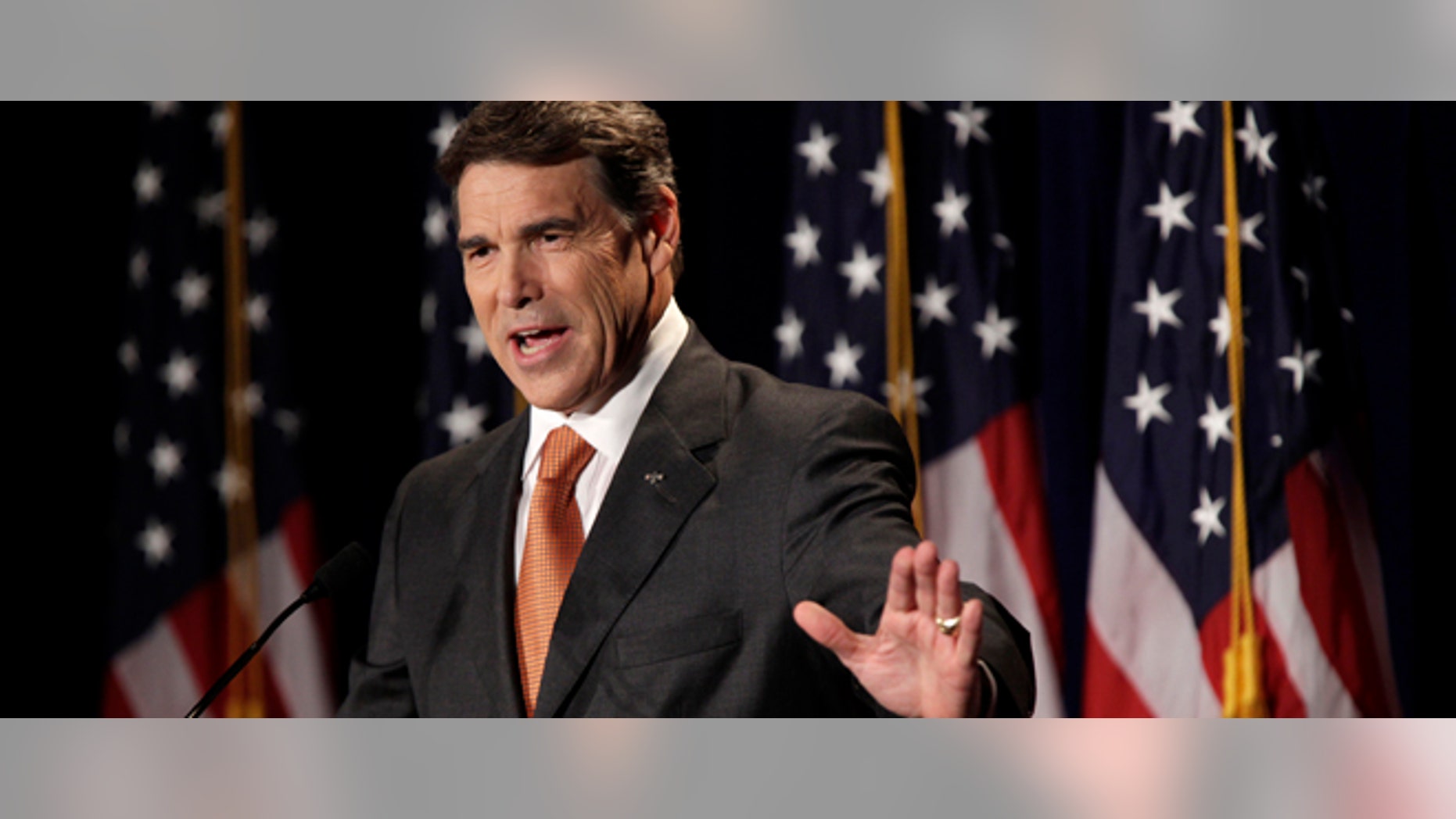 AUG. 13: Texas Gov. Rick Perry speaks during his announcement that he will run for the Republican presidential nomination in Charleston, South Carolina. (Photo by Richard Ellis/Getty Images)