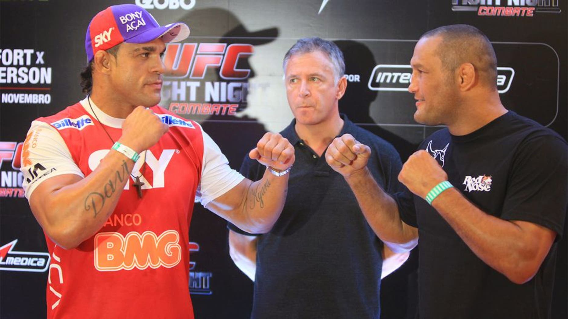 GOIANIA, BRAZIL - NOVEMBER 7: (L-R) Opponents Vitor Belfort and Dan Henderson face off during UFC Fight Night open workout at Buena Vista Shopping on November 7, 2013 in Goiania, Brazil. (Photo by Weimer Carvalho/Zuffa LLC/Zuffa LLC via Getty Images)