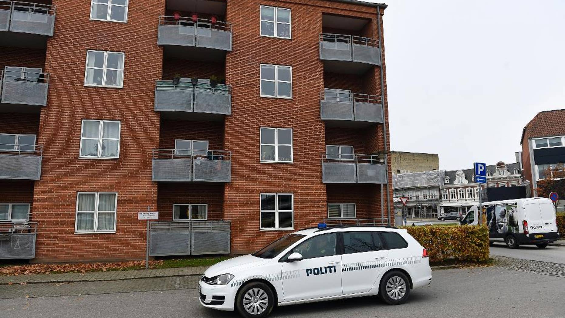 Police vehicles outside an apartment building in Aabenraa, Denmark, Monday Oct. 31, 2016, where Danish police say the remains of a 27-year-old Syrian woman and her two daughters, aged 7 and 9, were found in a freezer inside their apartment. Police made the gruesome discovery Sunday in the town of Aabenraa after a relative of the woman told them he hadn’t been able to reach her for a few days. (Claus Bonnerup/AP via Polfoto) DENMARK OUT