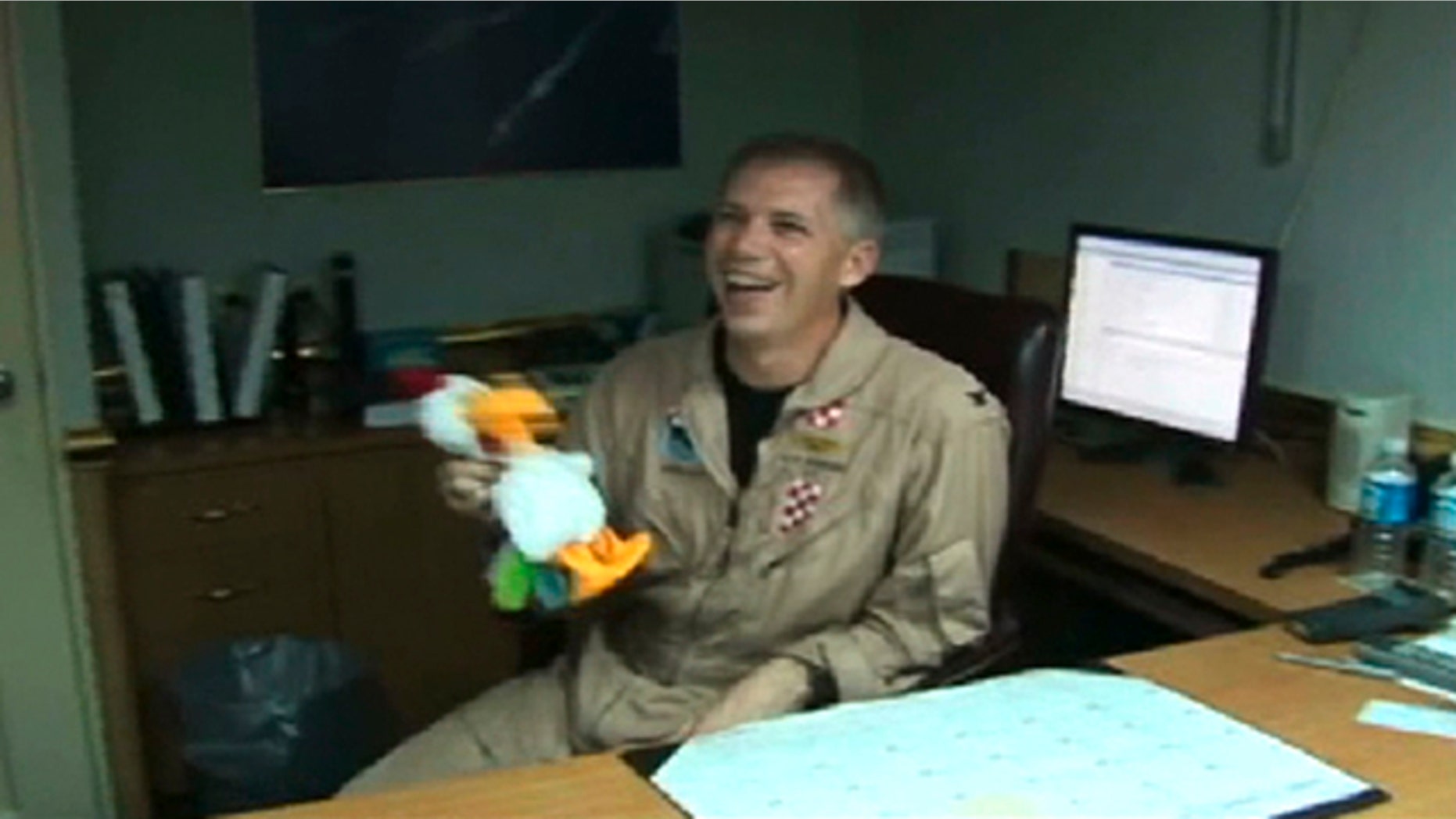 In this frame grab taken from video obtained by the Virginian-Pilot newspaper, U.S. Navy Capt. Owen Honors appears in one of a series of profanity-laced comedy sketches that were broadcast on the USS Enterprise via closed-circuit television.
