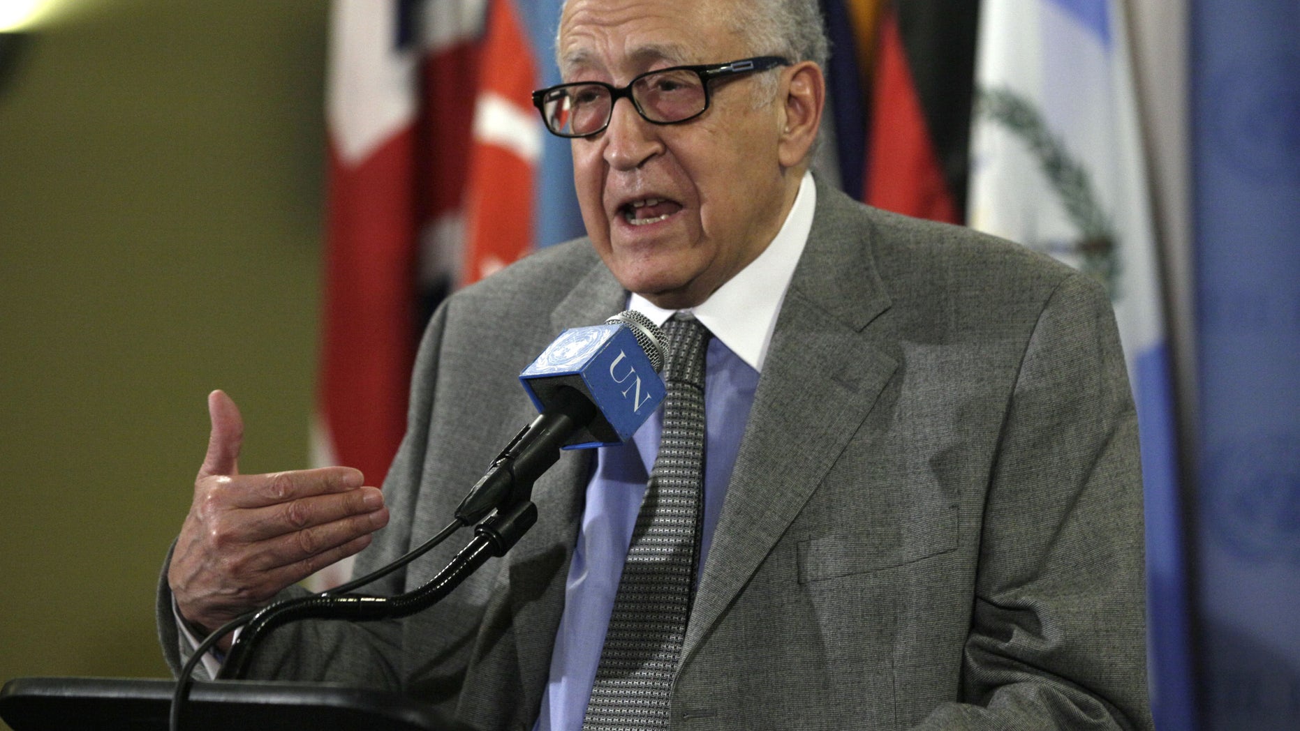 FILE - In this Nov. 29, 2012 file photo, Lakhdar Brahimi, Joint Special Representative of the United Nations and the League of Arab States for Syria, answers media questions after consultations at United Nations headquarters. A government airstrike on a bakery in a rebel-held town in central Syria killed more than 60 people, activists said, casting a pall over a visit by Brahimi, the international envoy charged with negotiating an end to the country's civil war. (AP Photo/Richard Drew, File)