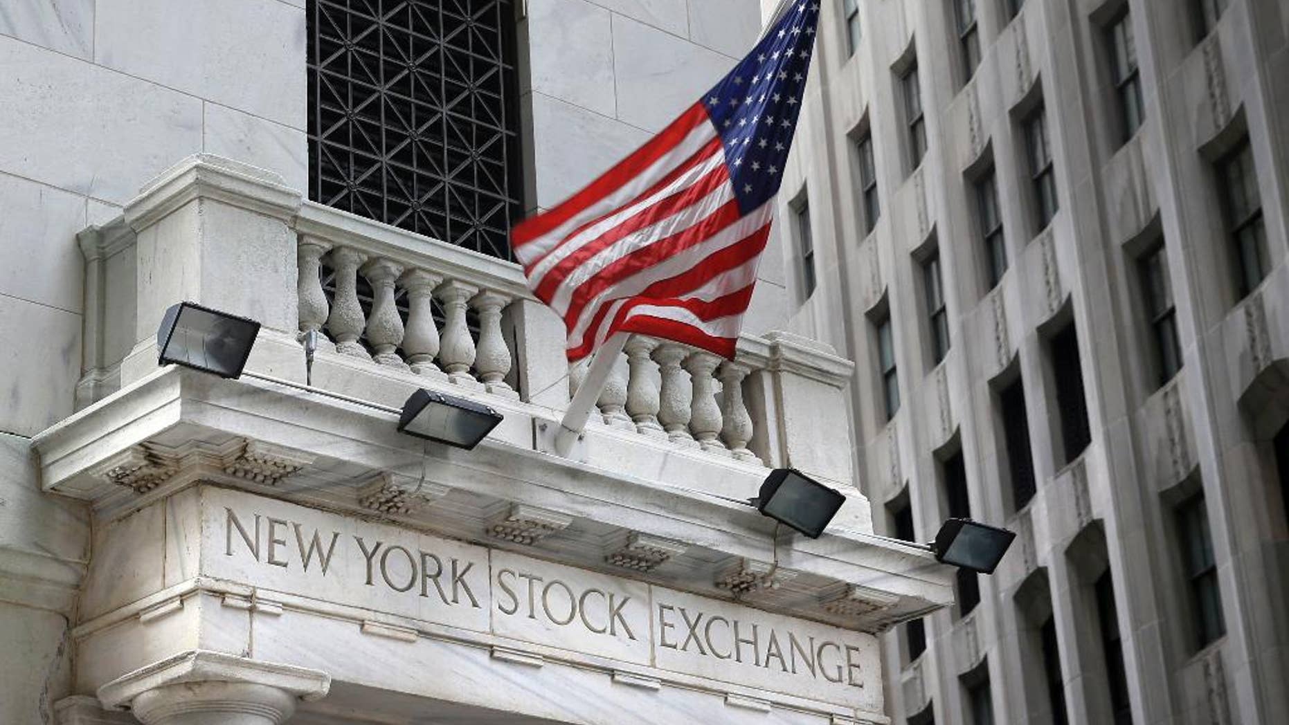FILE - This Monday, Aug. 24, 2015, file photo, shows the New York Stock Exchange. U.S stocks fell in early trading Tuesday, Dec. 8, 2015, following a sell-off in Asia and Europe as the price of oil continued to slide to seven-year lows. The losses were broad, with all 10 industry sectors of the Standard and Poor's 500 index down. (AP Photo/Seth Wenig, File)