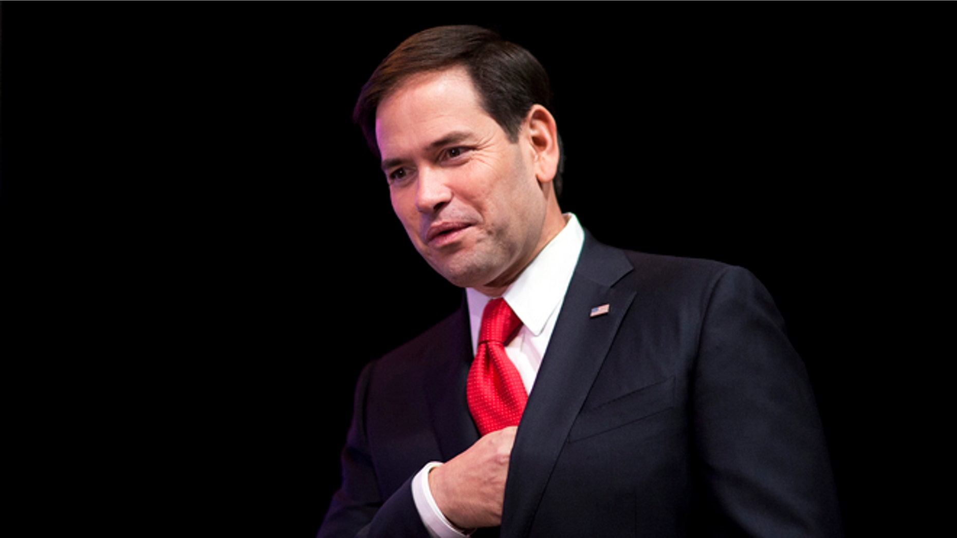 FILE - In this Aug. 7, 2015, file photo, Republican presidential candidate Sen. Marco Rubio, R-Fla., steps on the stage to speak at the RedState Gathering in Atlanta. Rubio will lay out a strategy on Friday, Aug. 14, to deal with the "tyrannical regimes" of Cuba and Iran, the same day Secretary of State John Kerry attends a historic flag-raising ceremony at the U.S. Embassy in Havana. (AP Photo/David Goldman, File)