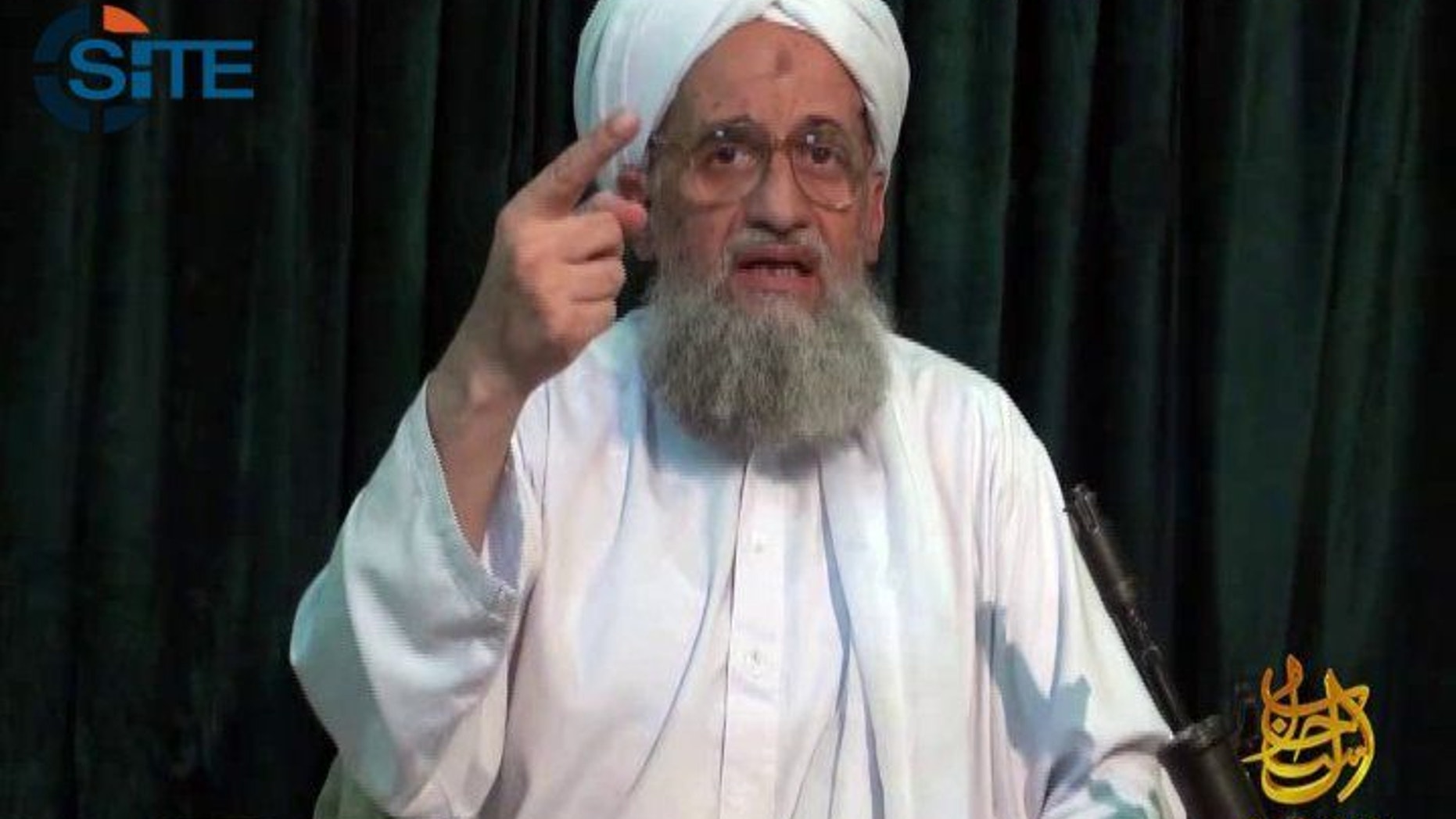 FILE -- In this undated file frame grab from video provided by IntelCenter, an American private terrorist threat analysis company, shows Al-Qaida's leader Ayman Al-Zawahri in a still image from a web posting by al-Qaida's media arm, as-Sahab, Wednesday July 27, 2011. Al-Qaida's leader has urged Muslims in Arab Spring countries to unite to institute an Islamic state, while warning France that its intervention in Mali will be bogged down, in a 103-minute audio message posted on militant websites late Saturday, April 6, 2013. In the recording, al-Zawahri urged Muslims to liberate their lands, apply Islamic law, halt the plundering of Muslim wealth, support rebellious Muslims and oppressed people worldwide, and establish the Islamic Caliphate, or religious state. (AP Photo/IntelCenter, File) THE ASSOCIATED PRESS HAS NO WAY OF INDEPENDENTLY VERIFYING THE CONTENT, LOCATION OR DATE OF THIS PICTURE. NO SALES MANDATORY CREDIT, INTELCENTER