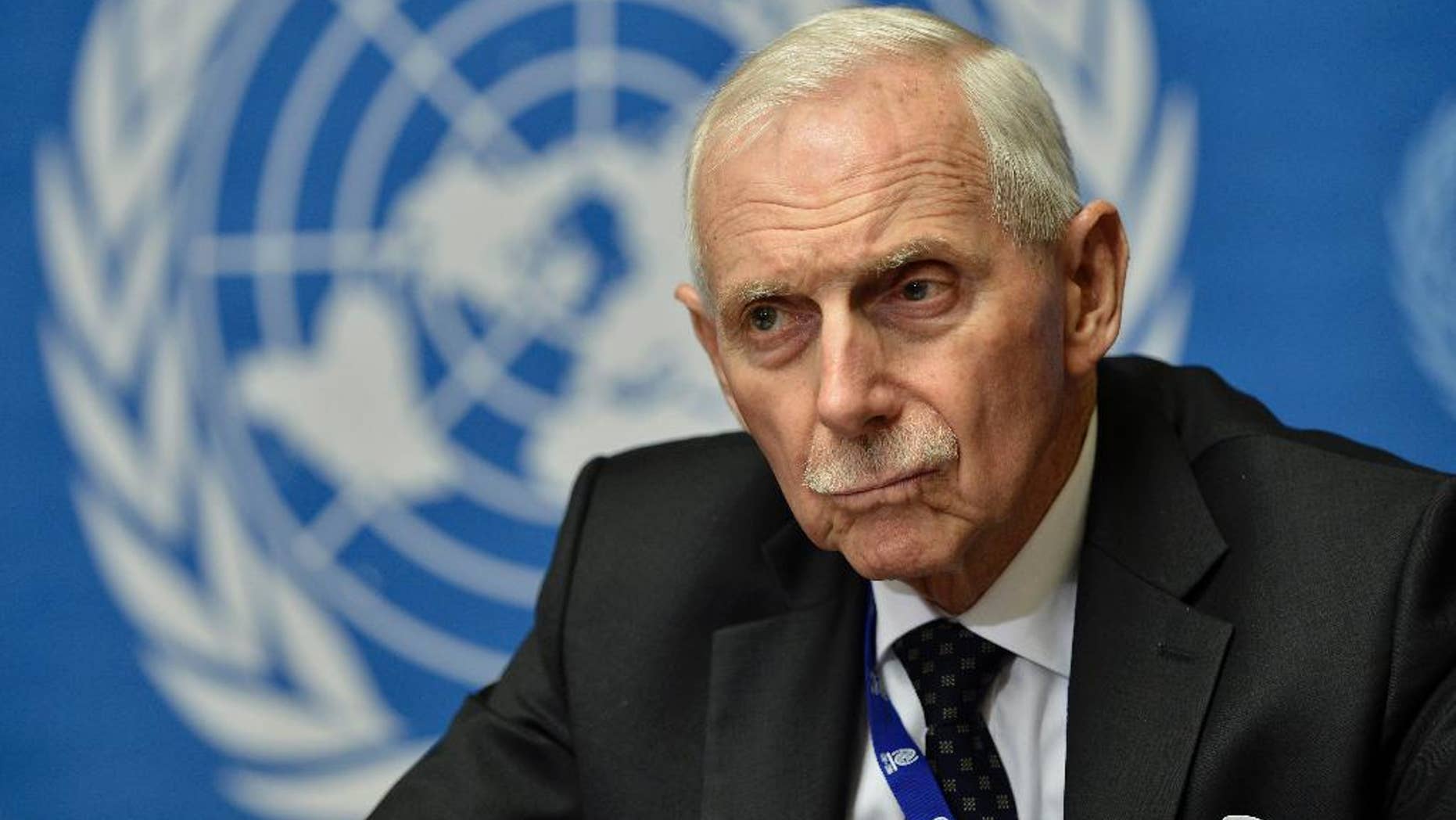 FILE - In this Friday, June 7, 2013 file photo, William Lacy Swing, Director-General of the International Organization for Migration (IOM) attends a news conference concerning the launch of a regional response for Syrian refugees and the Syrian humanitarian assistance response plan, at the European headquarters of the United Nations in Geneva, Switzerland. Swing said Monday, Aug. 31, 2015 that aid groups like his are ready to help the European Union handle an influx of migrants, but governments must reach out. (Martial Trezzini/Keystone via AP, File)