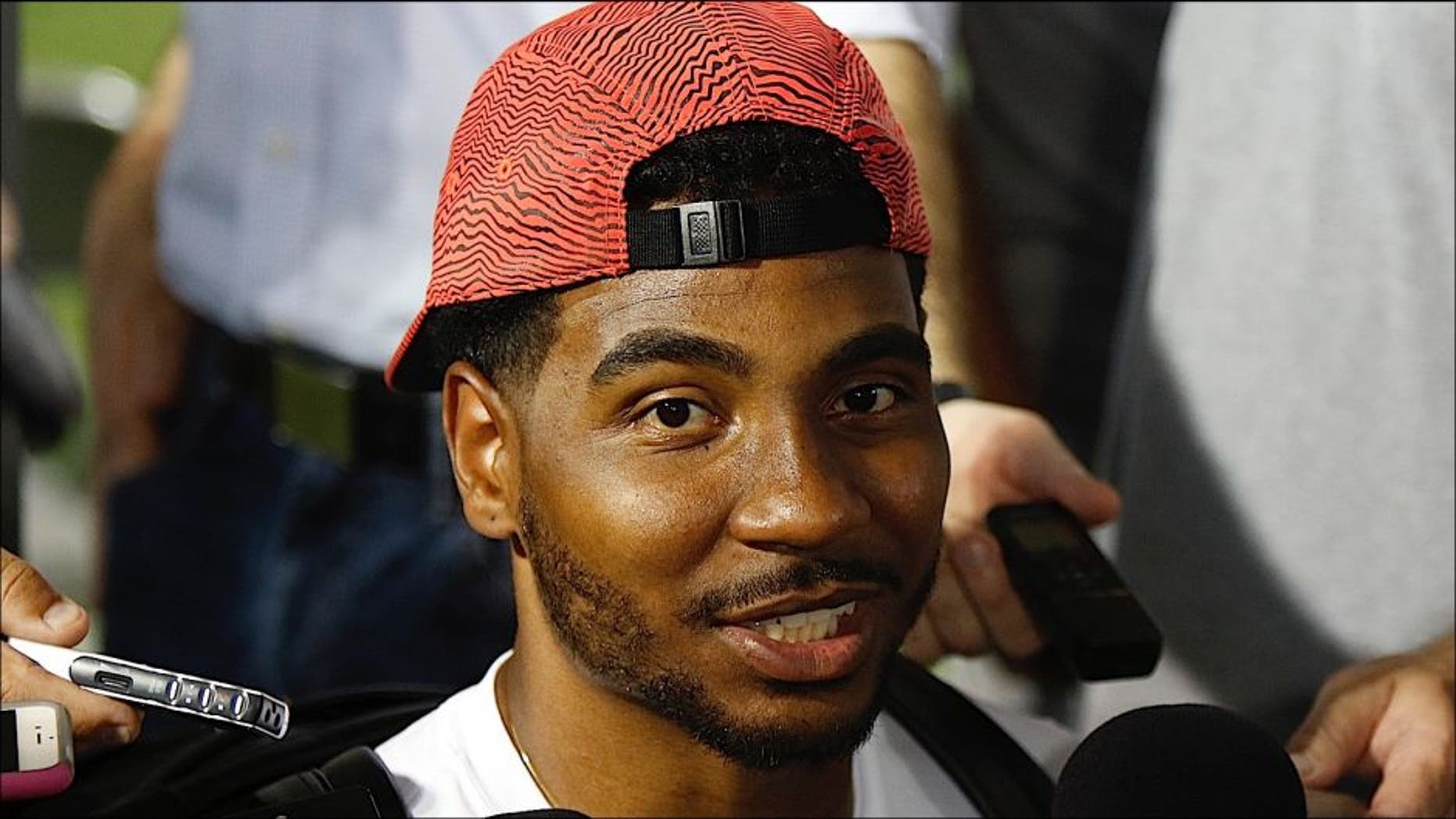 Former Ohio State quarterback turned wide receiver Braxton Miller speaks to reporters during the university's NCAA college football media day in Columbus, Ohio, Sunday, Aug. 16, 2015. (AP Photo/Paul Vernon)