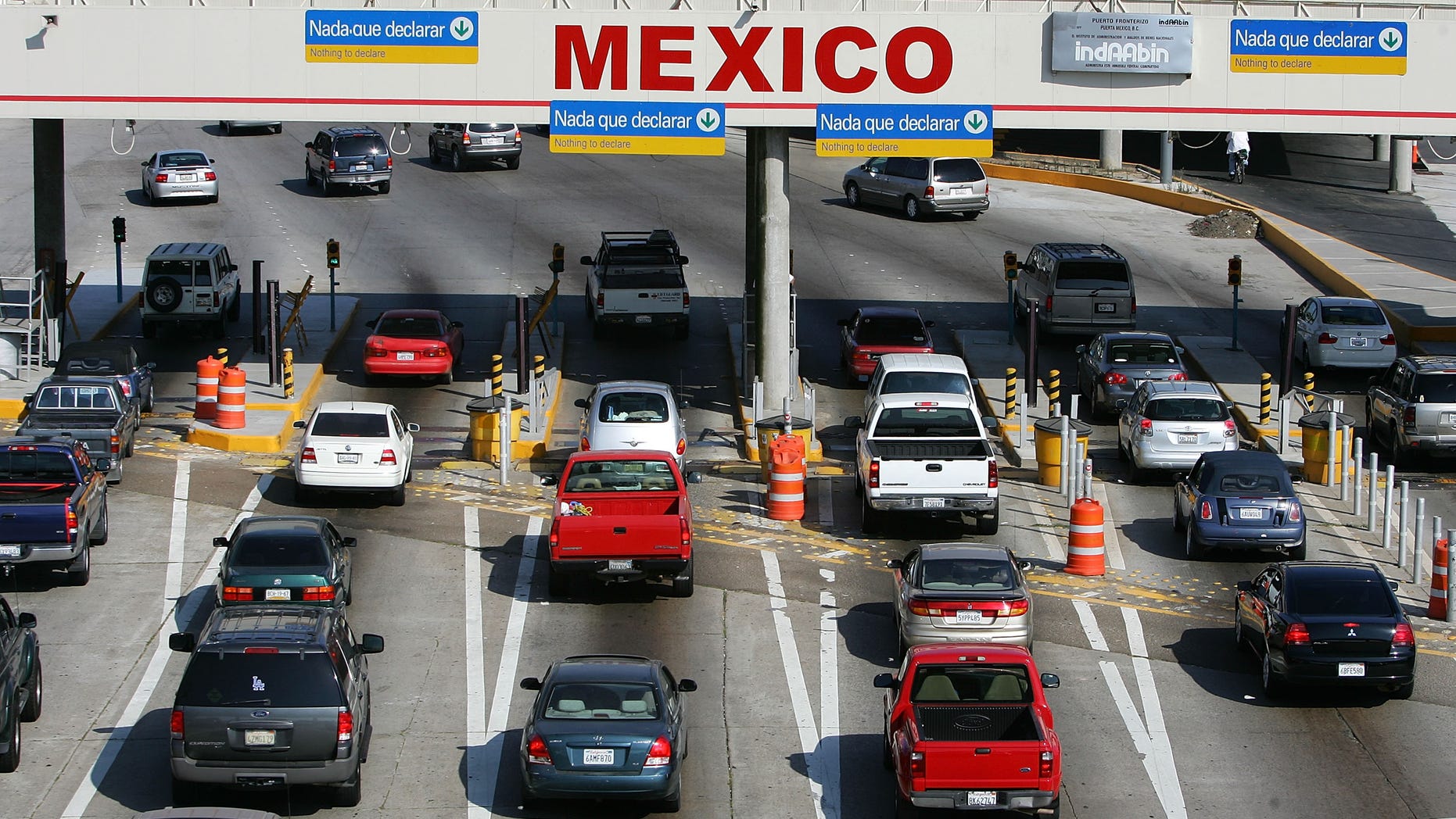TIJUANA, MEXICO - JUNE 27: Traffic in the US enters Mexico at the San Ysidro border crossing, the world's busiest, on June 27, 2008 in Tijuana, Mexico. With the cost of gasoline in California around $4.60 per gallon, many drivers are buying their fuel in Mexico for about $3.20. There is a price to pay for cheaper gas though. Mexican gas is formulated with more sulfur than California gas and that can damage the emission control equipment on US cars, causing them to fail emissions tests and leading to expensive repairs. In addition, unless a driver has other business in Mexico, part of their fuel savings will be burned up idling in a line that can easily last for hours to get back into the US. (Photo by David McNew/Getty Images)