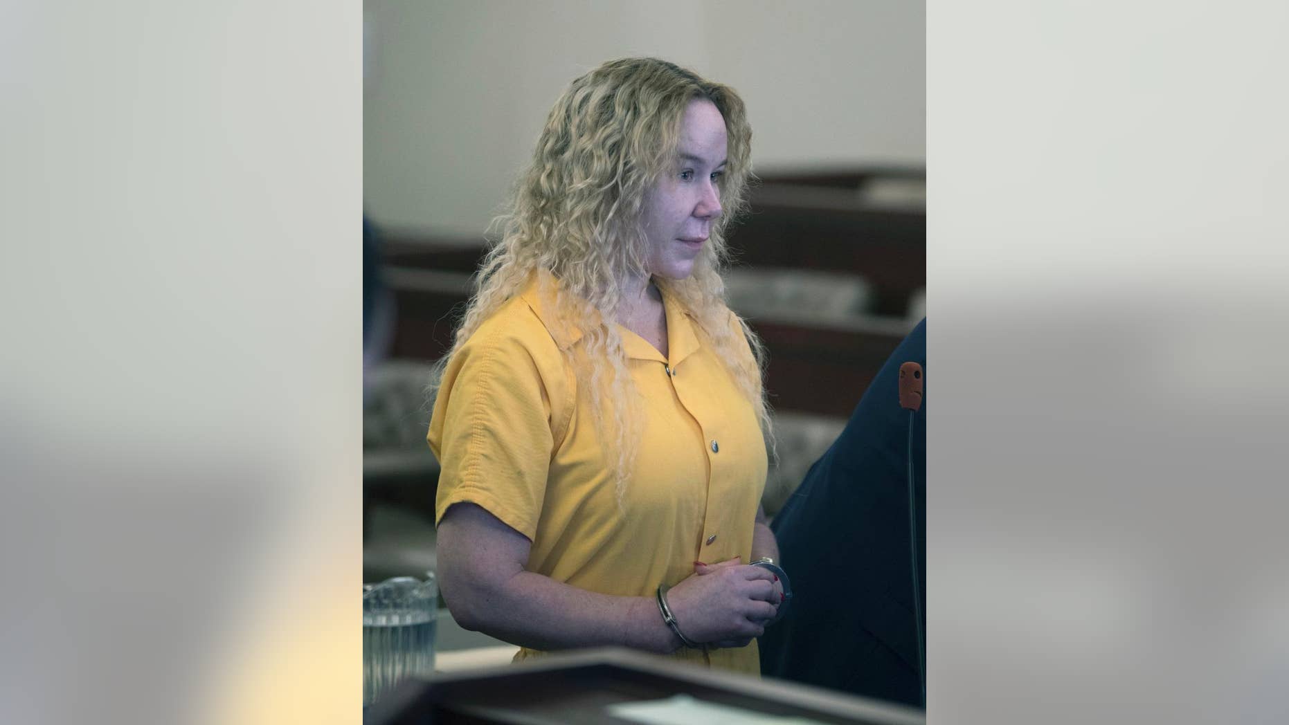 FILE - In this Nov. 18, 2016 file photo, Alexandria Duval, accused of killing her twin sister by driving their SUV off a cliff in Hawaii, stands in Albany County Court in Albany, N.Y. The lawyer for Duval says she won't fight extradition from upstate New York and plans to waive her right to a hearing during a court appearance Friday, Dec. 9. That would clear the way for her to return to Hawaii, where she faces a second-degree murder charge. (AP Photo/Mike Groll, File)