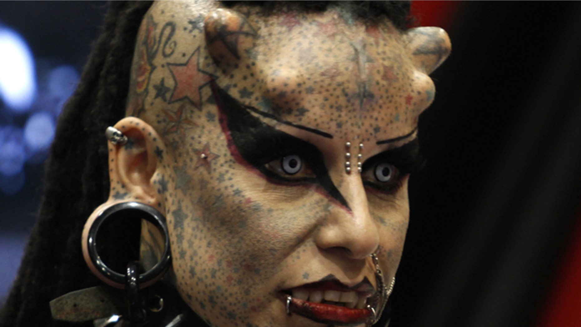Mexican tattoo artist Maria Jose Cristerna, known as 'Mujer Vampiro' (Vampire Woman), attends a photo opportunity during the "Expo Tatuaje" international tattoo expo in Monterrey April 3, 2011.