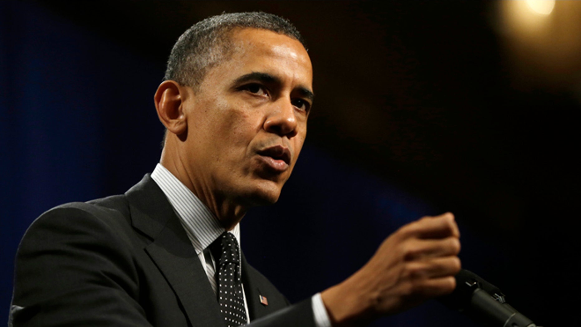 President Barack Obama gestures as he speaks at the House Democratic Issues Conference in Lansdowne, Va., Thursday, Feb. 7, 2013. (AP Photo/Charles Dharapak)