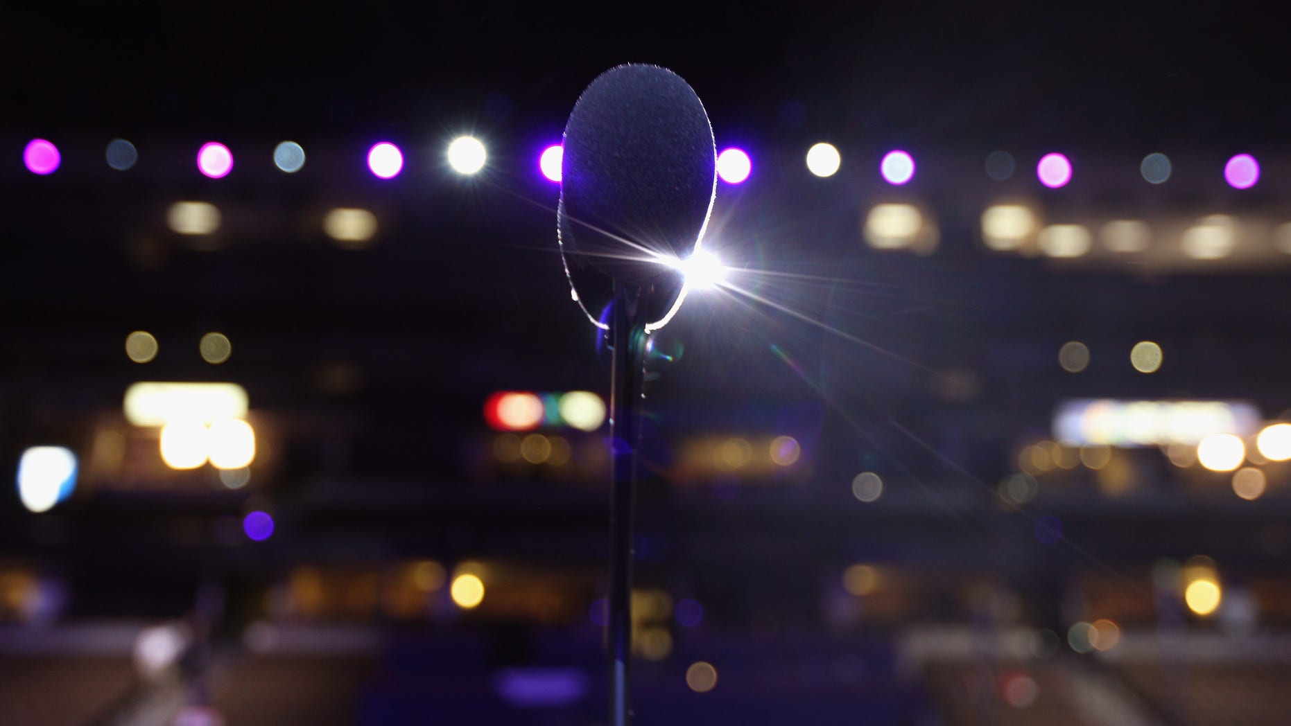 DENVER - AUGUST 22: The microphone stands ready at the main podium where speakers will address delegates to the Democratic National Convention at the Pepsi Center in Denver, Colorado August 22, 2008 Some 1,500 students visited the convention hall Friday to see the unveiling of the Convention podium. (Photo by John Moore/Getty Images)