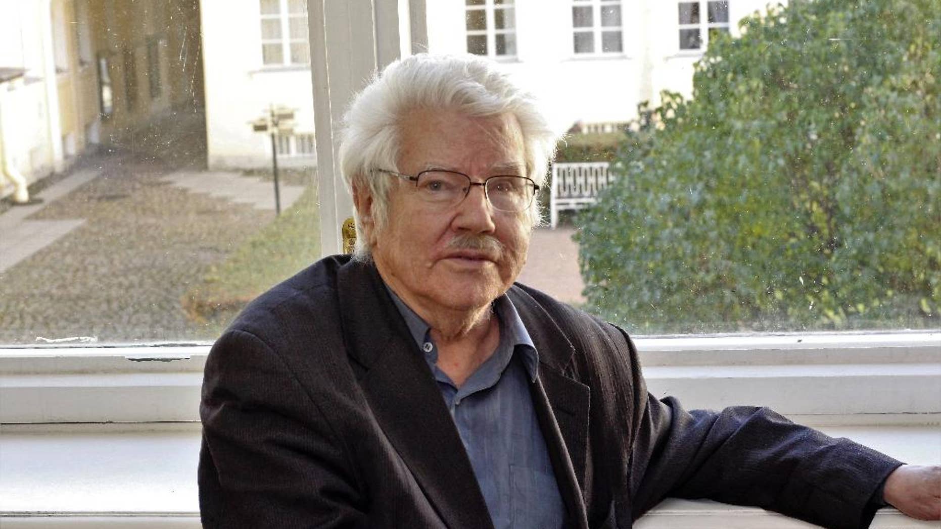 In this photo taken on Sunday, Oct. 9, 2016, prominent Russian journalist Nikolai Andrushchenko poses in St. Petersburg, Russia. 73-year old Andrushchenko, has died of his injuries six weeks after being attacked in St. Petersburg, is reported Wednesday April 19, 2017, by Russian media outlets, citing his lawyer and the editor-in-chief of his newspaper, Novy Peterburg. (AP Photo/Denis Usov)