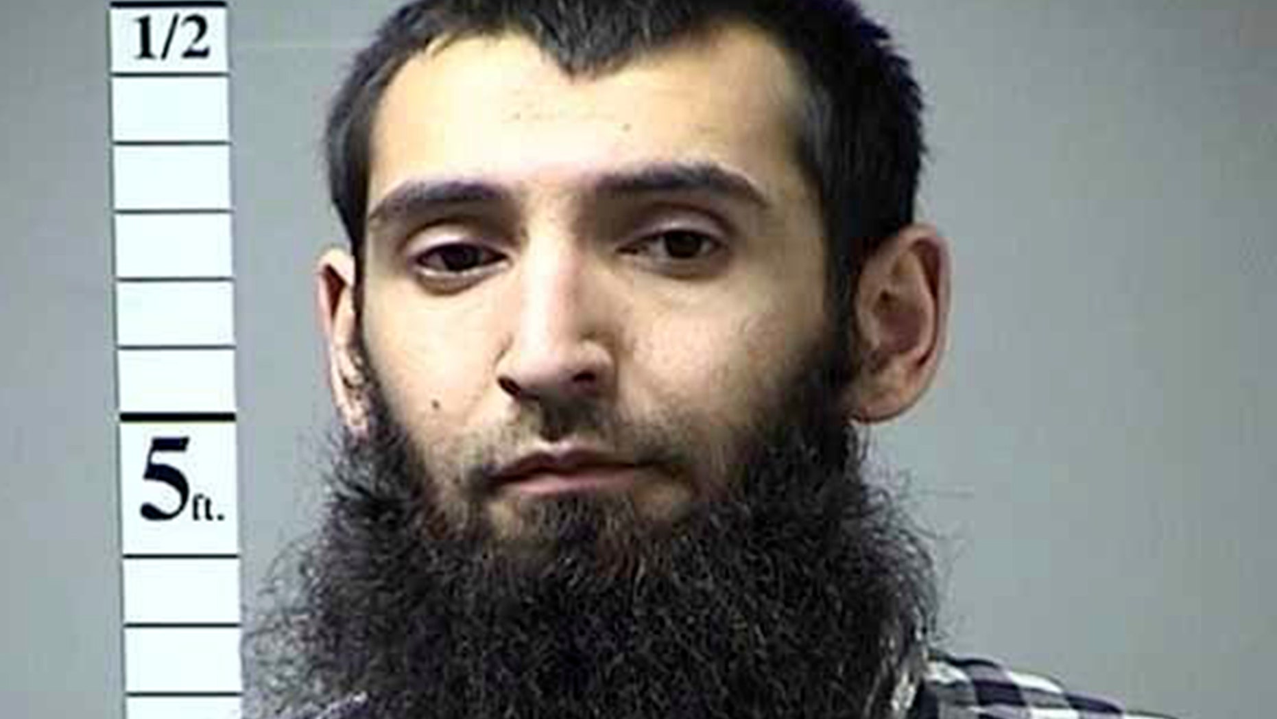 This undated photo provided by St. Charles County Department of Corrections via KMOV shows the Sayfullo Saipov. A man in a rented pickup truck mowed down pedestrians and cyclists along a busy bike path near the World Trade Center memorial on Tuesday, Oct. 31, 2017, killing several. Officials who were not authorized to discuss the investigation and spoke on the condition of anonymity identified the attacker Saipov. (St. Charles County Department of Corrections/KMOV via AP)