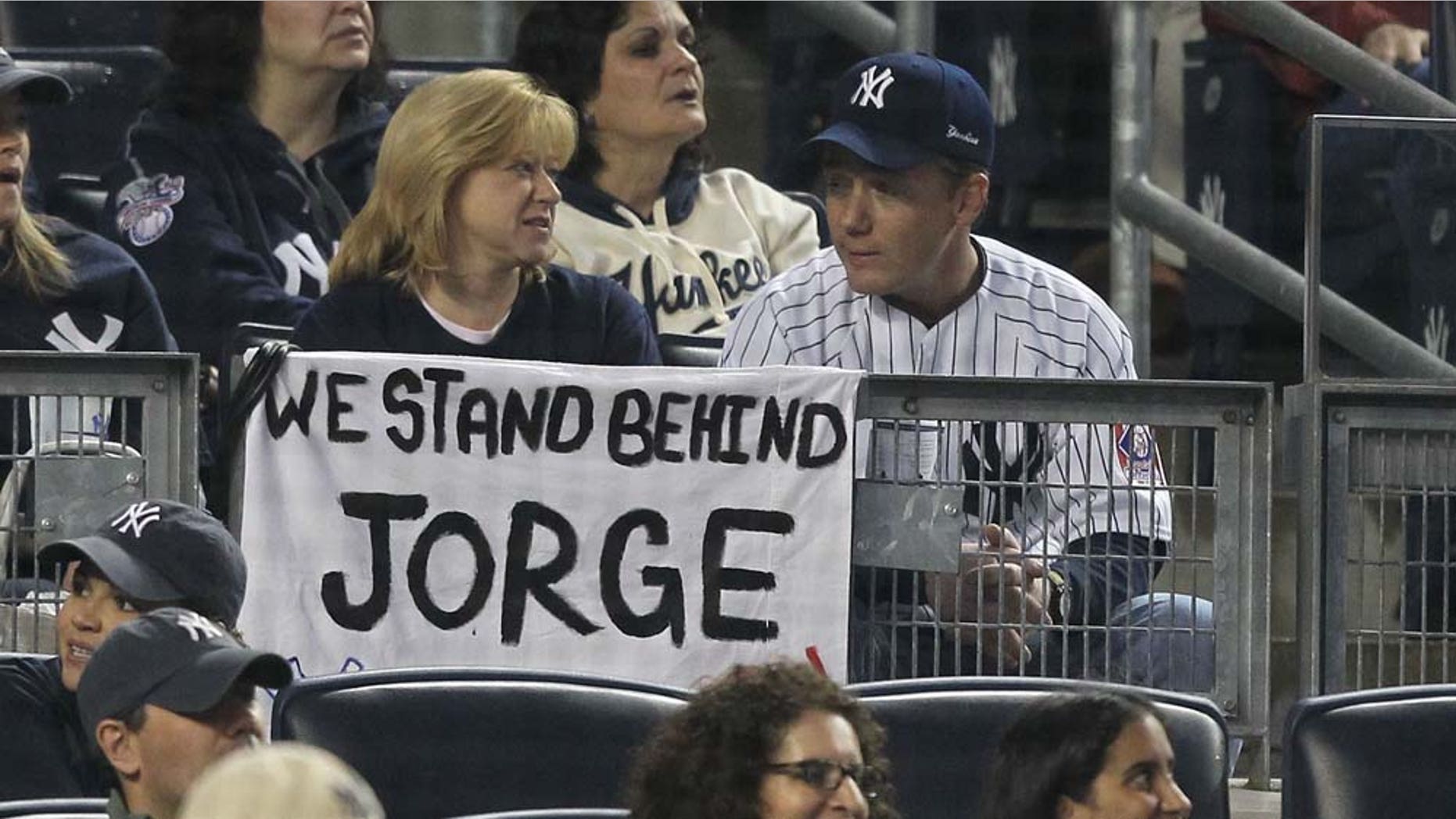 NEW YORK, NY - MAY 15: A fan holds a sign in support of Jorge Posada of the New York Yankees during their game against the Boston Red Sox on May 15, 2011 at Yankee Stadium in the Bronx borough of New York City. (Photo by Al Bello/Getty Images)