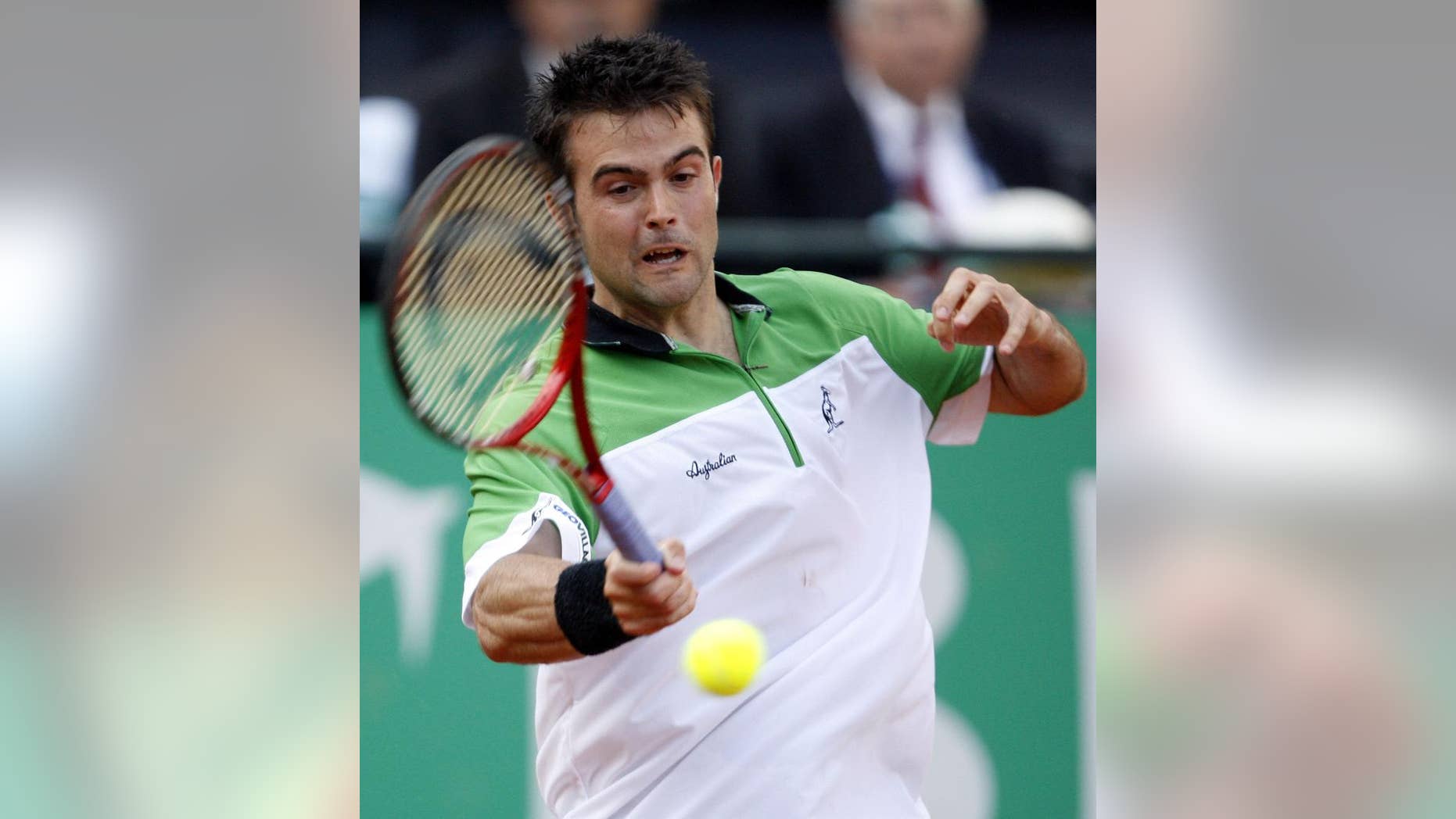 FILE - In this Wednesday, May 9, 2007 file photo, Daniele Bracciali returns the ball to Spain's Rafael Nadal at the Rome Masters tennis tournament in Rome. Italian tennis player Daniele Bracciali has partially admitted to match-fixing. Italian prosecutor Roberto Di Martino tells The Associated Press that Bracciali "admitted a few things and denied a few things" during a hearing last week with judicial authorities. Bracciali and occasional doubles partner Potito Starace are facing corruption accusations after intercepted Internet conversations claiming they sold matches were printed in Italian media three weeks ago. The conversations are part of the extensive data that investigators in Cremona led by Di Martino have been sorting through in a soccer match-fixing inquiry. (AP Photo/Andrew Medichini, Files)