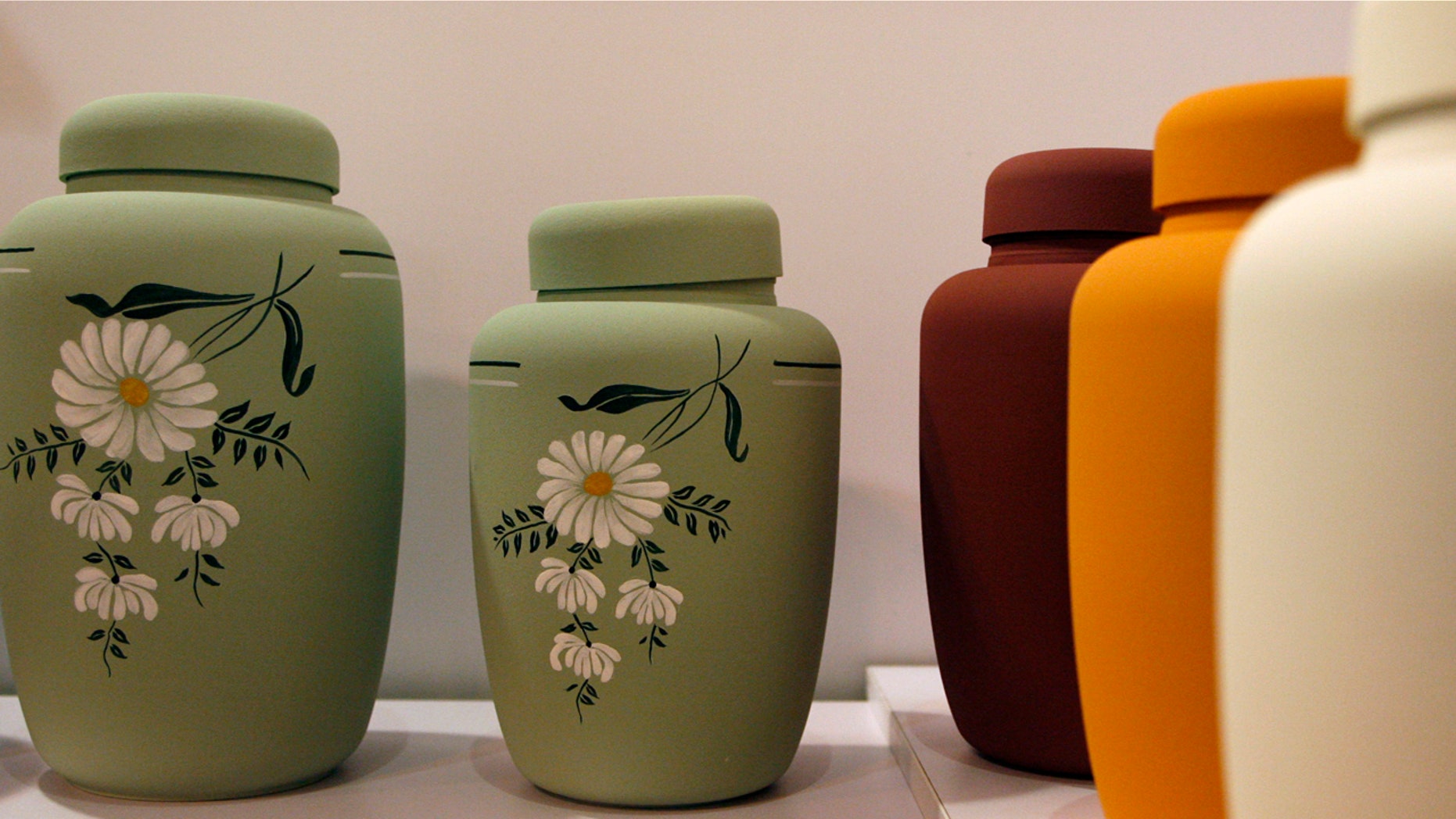 FILE: Eco-friendly cremation urns are displayed during the Asia Funeral Expo at the Macau Tower Convention center.
