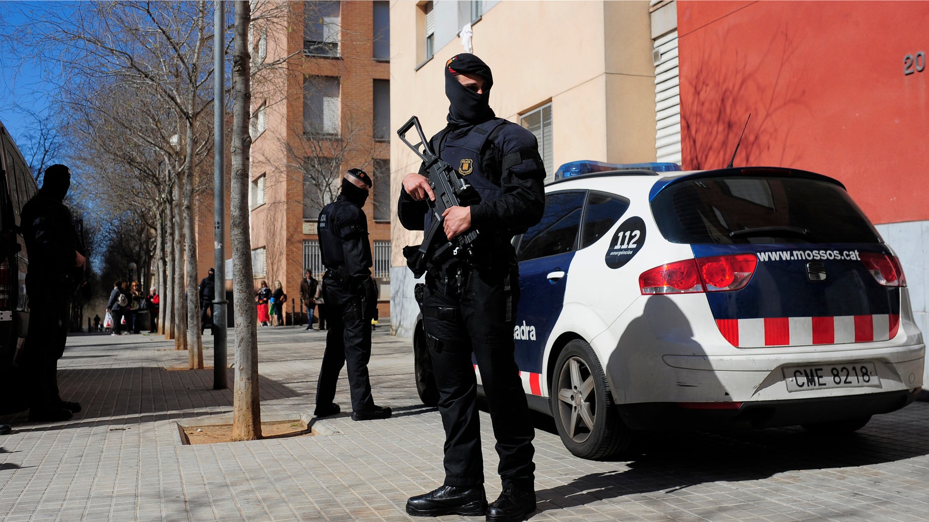 Regional police officers during a raid against jihad activity in Sabadell, near Barcelona, Wednesday, April 8, 2015.
