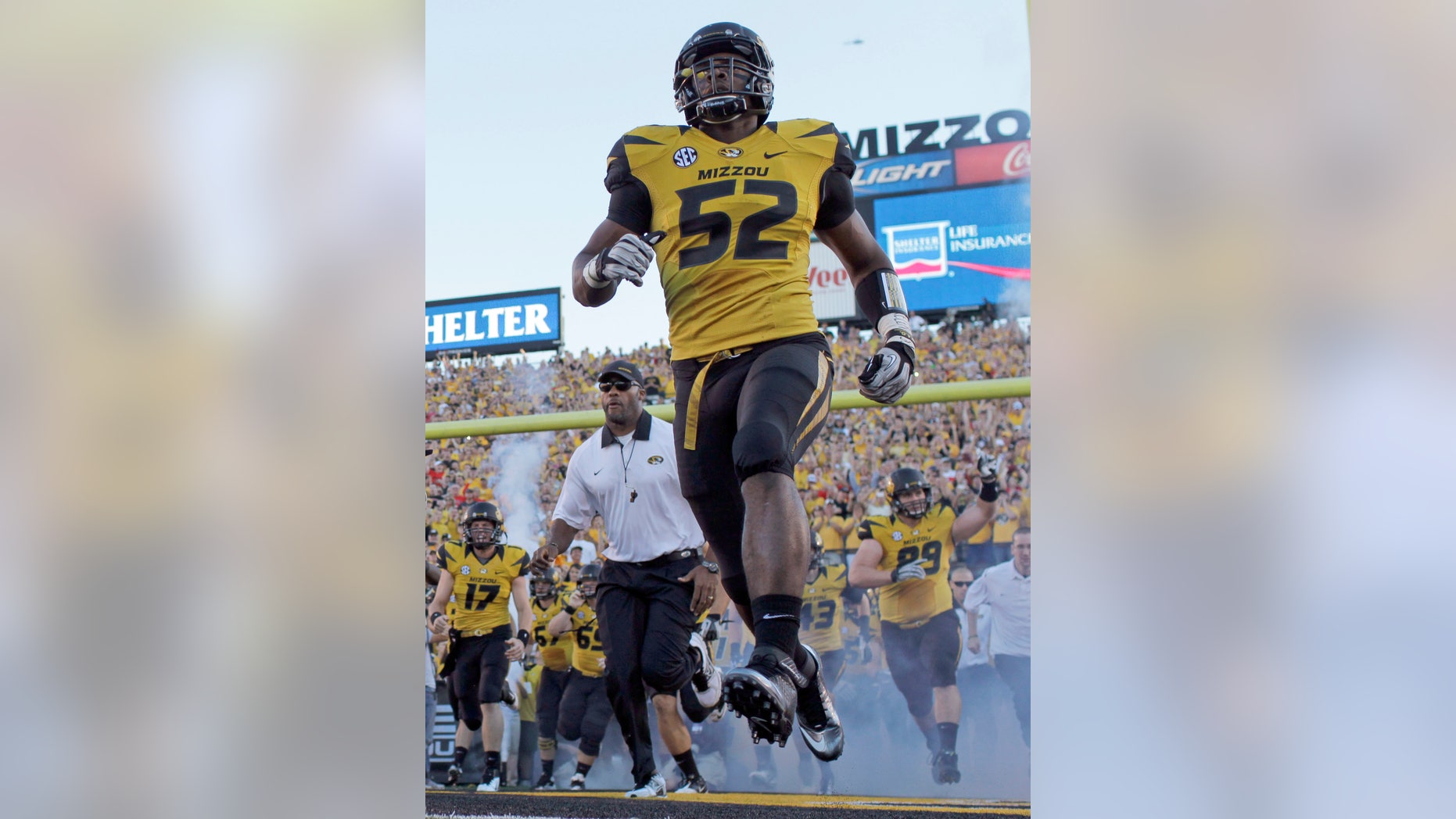 FILE - In this Sept. 8, 2012 file photo, Missouri's Michael Sam (52) runs onto the field along with their teammates before the start of an NCAA college football game against Georgia in Columbia, Mo. Michael Sam hopes his ability is all that matters, not his sexual orientation. Missouri's All-America defensive end came out to the entire country Sunday night, Feb. 9, 2014, and could become the first openly gay player in America's most popular sport. (AP Photo/Jeff Roberson, File)