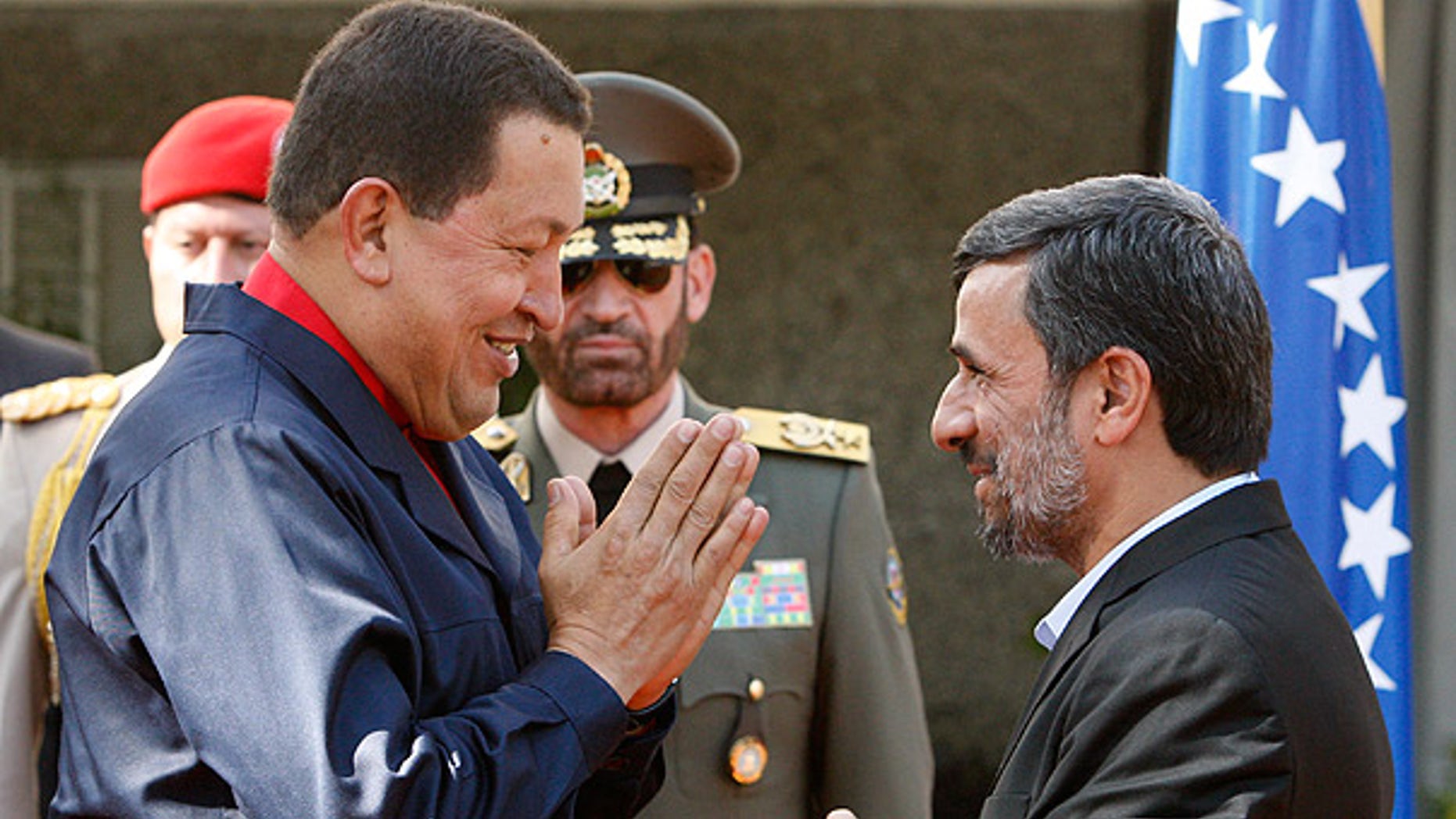 Oct. 19: Venezuelan President Hugo Chavez, left, is welcomed by his Iranian counterpart Mahmoud Ahmadinejad in Tehran.