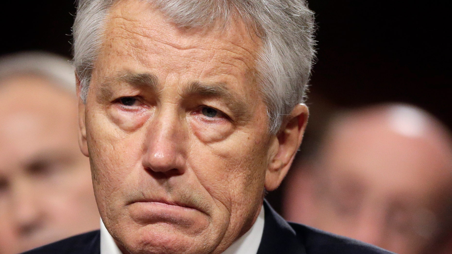 FILE - In this Jan. 31, 2103 file photo, former Nebraska Republican Sen. Chuck Hagel, President Obama's choice for defense secretary, testifies before the Senate Armed Services Committee during his confirmation hearing on Capitol Hill in Washington. Sen. Carl Levin, D-Mich., the chairman of the Senate Armed Services Committee, pushed ahead Monday with plans for a vote on Hagel's nomination to be defense secretary despite Republican demands for more financial information from him. (AP Photo/J. Scott Applewhite, File)