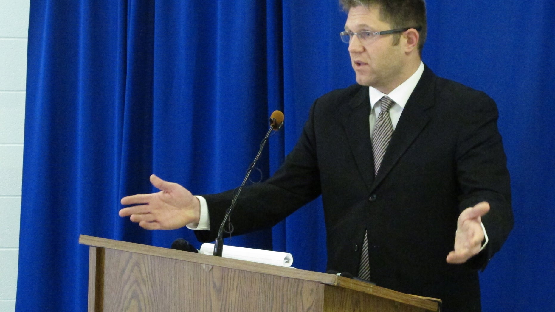 Federal public defender Allen Bohnert talks about the execution of his client, death row inmate Dennis McGuire, by a never-tried lethal drug process, on Thursday, Jan. 16, 2014 at the Southern Ohio Correctional Facility in Lucasville, Ohio. After McGuire repeatedly gasped over several minutes before dying, Bohnert called the procedure "a failed agonizing experiment by the state of Ohio.” (AP Photo/Andrew Welsh-Huggins)