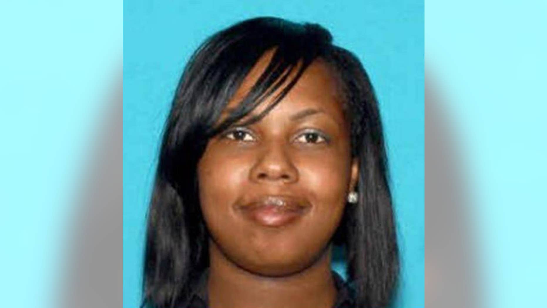 This undated photo from the FBI shows Shanika Minor of Milwaukee. The FBI said Friday, July 1, 2016, that Minor, who was added to its "10 Most Wanted Fugitives" list this week, was arrested Friday in North Carolina. Minor is accused of fatally shooting Tamecca Perry and her unborn child last March in Milwaukee. (FBI via AP)