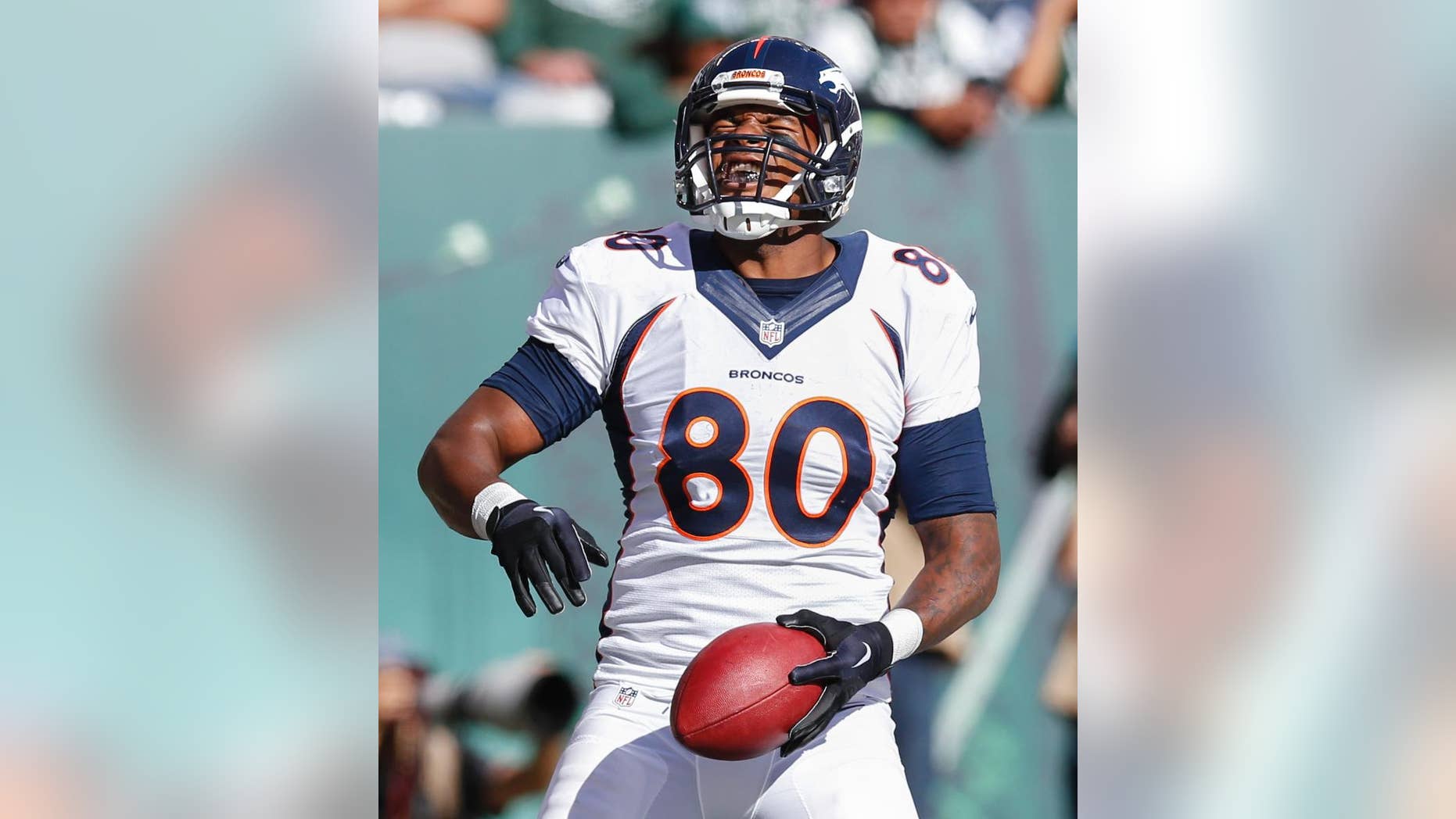 Denver Broncos tight end Julius Thomas (80) reacts after scoring a touchdown against the New York Jets during the third quarter of an NFL football game, Sunday, Oct. 12, 2014, in East Rutherford, N.J. (AP Photo/Kathy Willens)