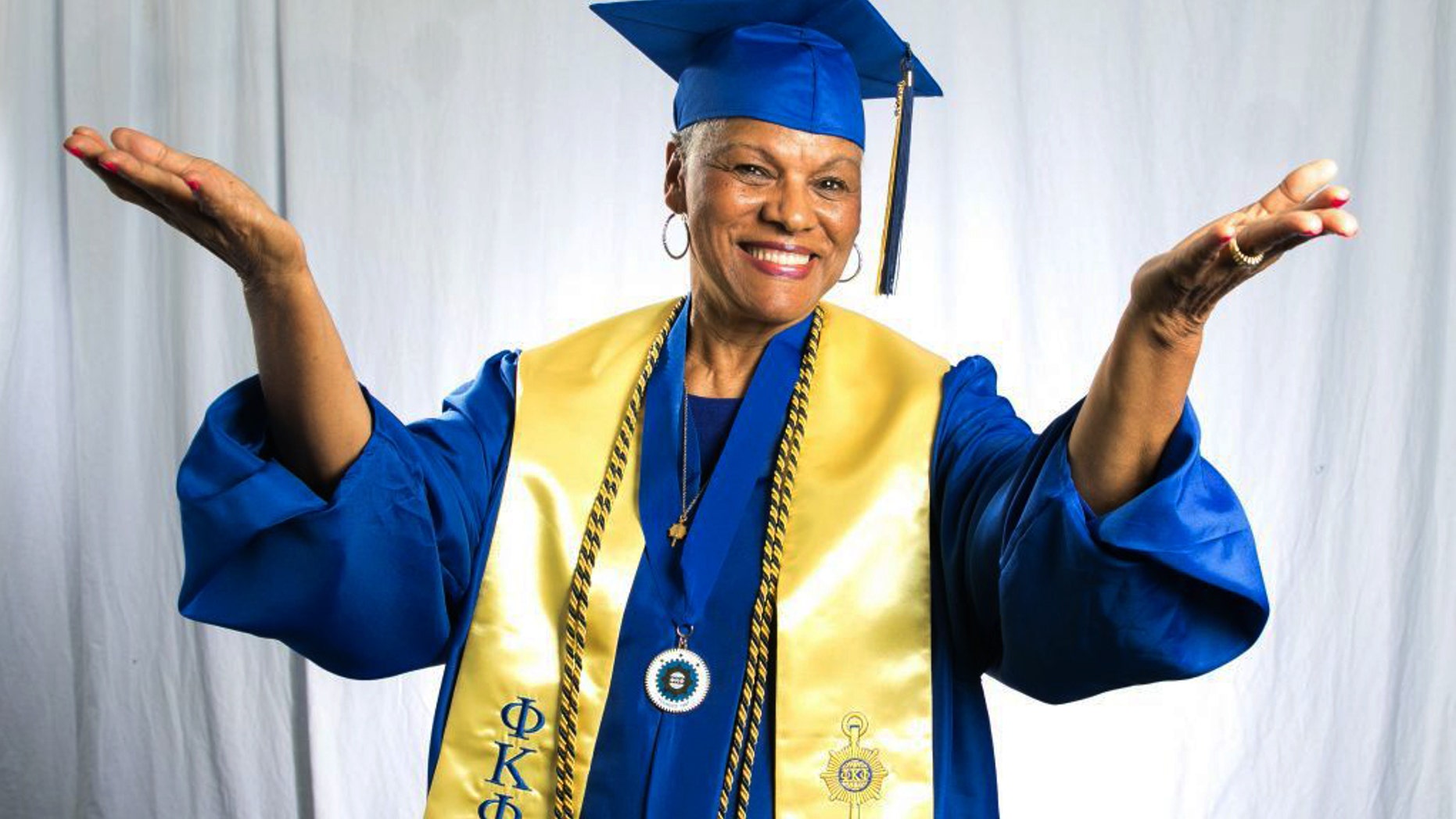 In this undated photo provided by Tennessee State University, Darlene Mullins poses at the university in Nashville, Tenn. Fifty-five years after she cut short her college education when she fell in love, Mullins has finally graduated. Tennessee State University says Mullins, a 72-year-old grandmother of four, participated in the school's undergraduate commencement ceremony Saturday, May 6, 2017. (Tennessee State University via AP)