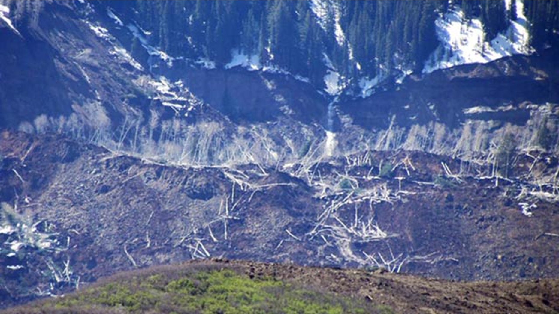 May 26, 2014: The results of a three-mile long mudslide are seen on Grand Mesa, where the slide started, in a remote part of western Colorado near the small town of Collbran. Rescue teams are searching for three men missing after a half-mile stretch of a ridge saturated with rain collapsed. (AP Photo/Mesa County Sheriff's Office)
