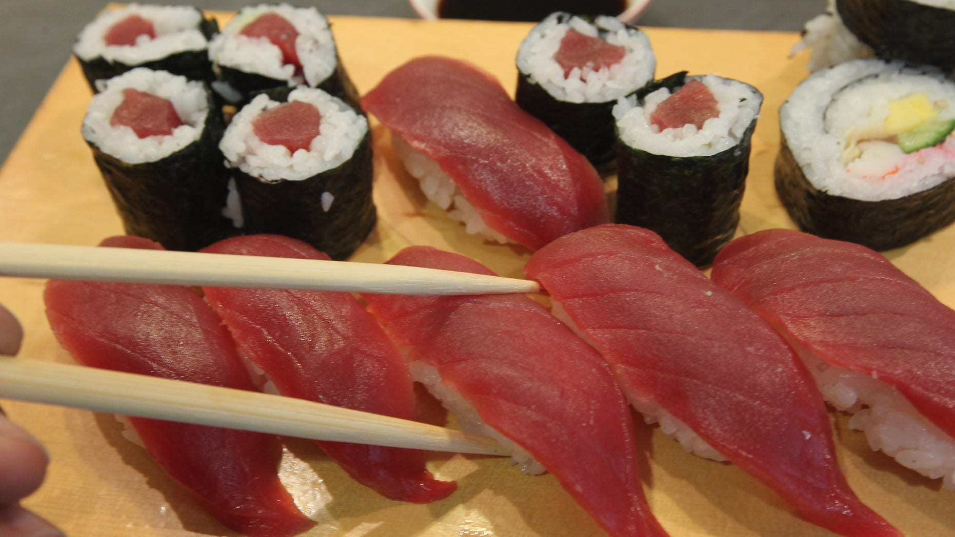 BERLIN - NOVEMBER 23: Sushi from yellowfin, or maguro, tuna lies on a customer's plate at a sushi restaurant on November 23, 2010 in Berlin, Germany. Yellowfin tuna is mostly fished in the Atlantic and is among the cheaper and more plentiful varieties of tuna. (Photo by Sean Gallup/Getty Images)