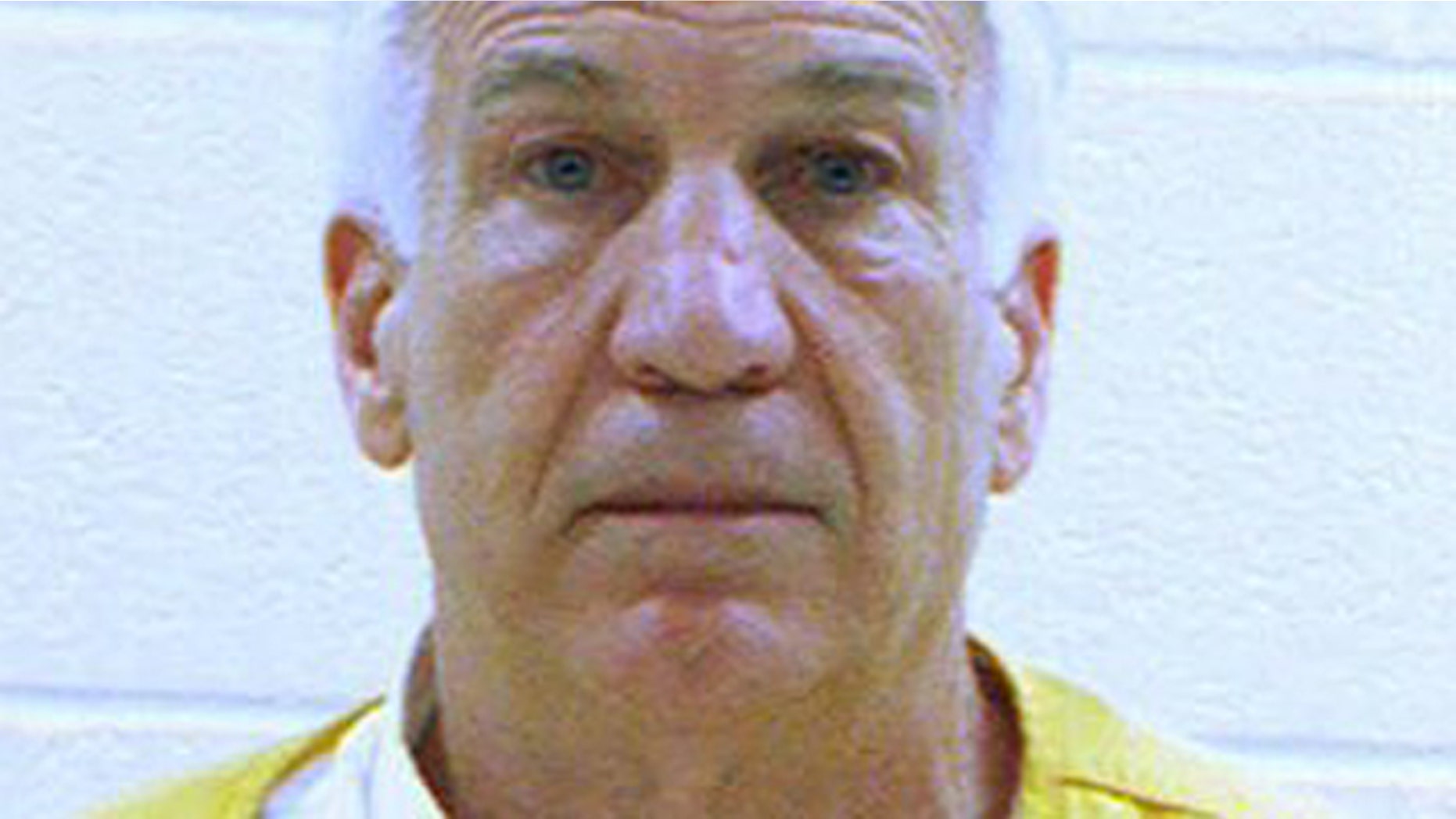 June 23, 2012: Former Penn State University assistant football coach Jerry Sandusky is shown in a booking photo. (AP/Centre County Correctional Facility)