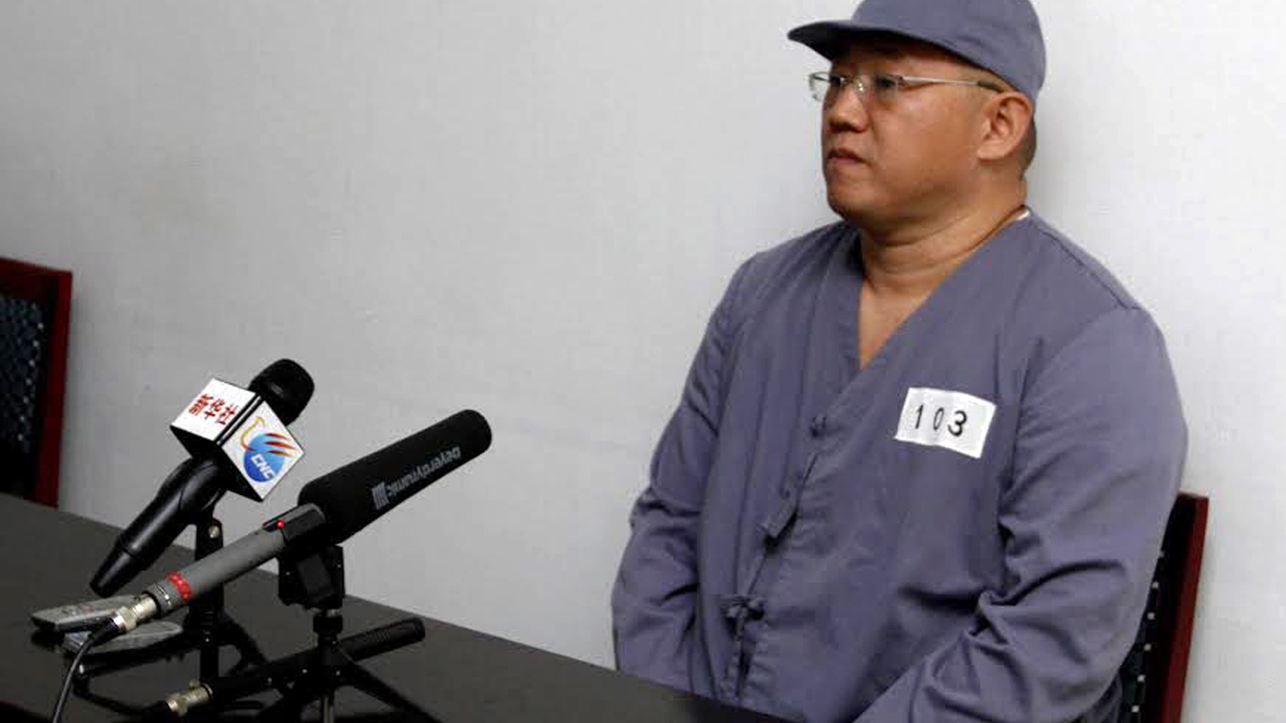 American missionary Kenneth Bae speaks to reporters at Pyongyang Friendship Hospital in Pyongyang Monday, Jan. 20, 2014. Bae, 45, who has been jailed in North Korea for more than a year, appealed for the U.S. to do its best to secure his release. (AP Photo/Kim Kwang Hyon)