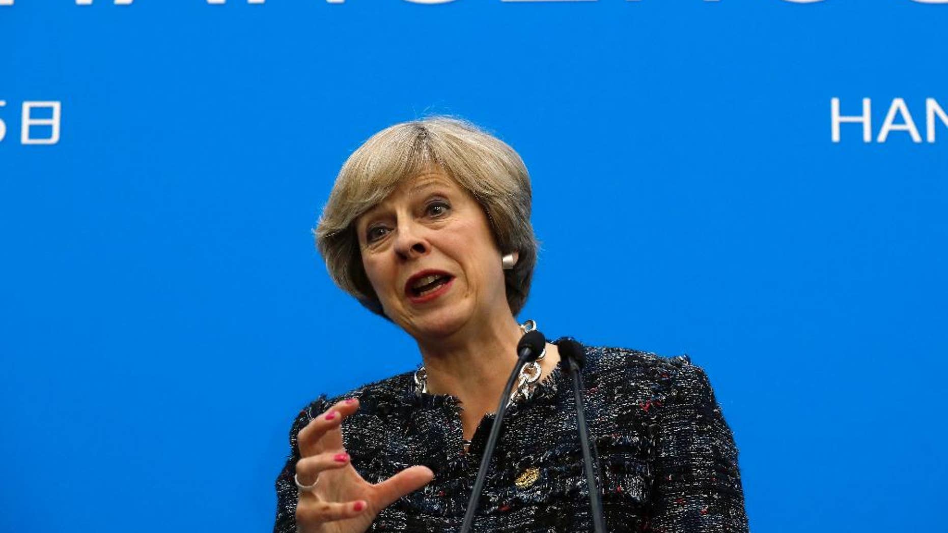 FILE - In this Monday, Sept. 5, 2016 file photo, British Prime Minister Theresa May speaks at a press conference held at the end of the G-20 summit in Hangzhou in eastern China's Zhejiang province. Since the U.K. voted to leave the European Union, Prime Minister Theresa May has said it again and again: Brexit means Brexit.Despite the mantra, it's far from clear what a British exit from the bloc will look like. Almost three months after the vote, Britons and Europeans still don’t know when the departure will happen and how it will affect their work, travel, pocketbooks and prospects.(AP Photo/Ng Han Guan, file)