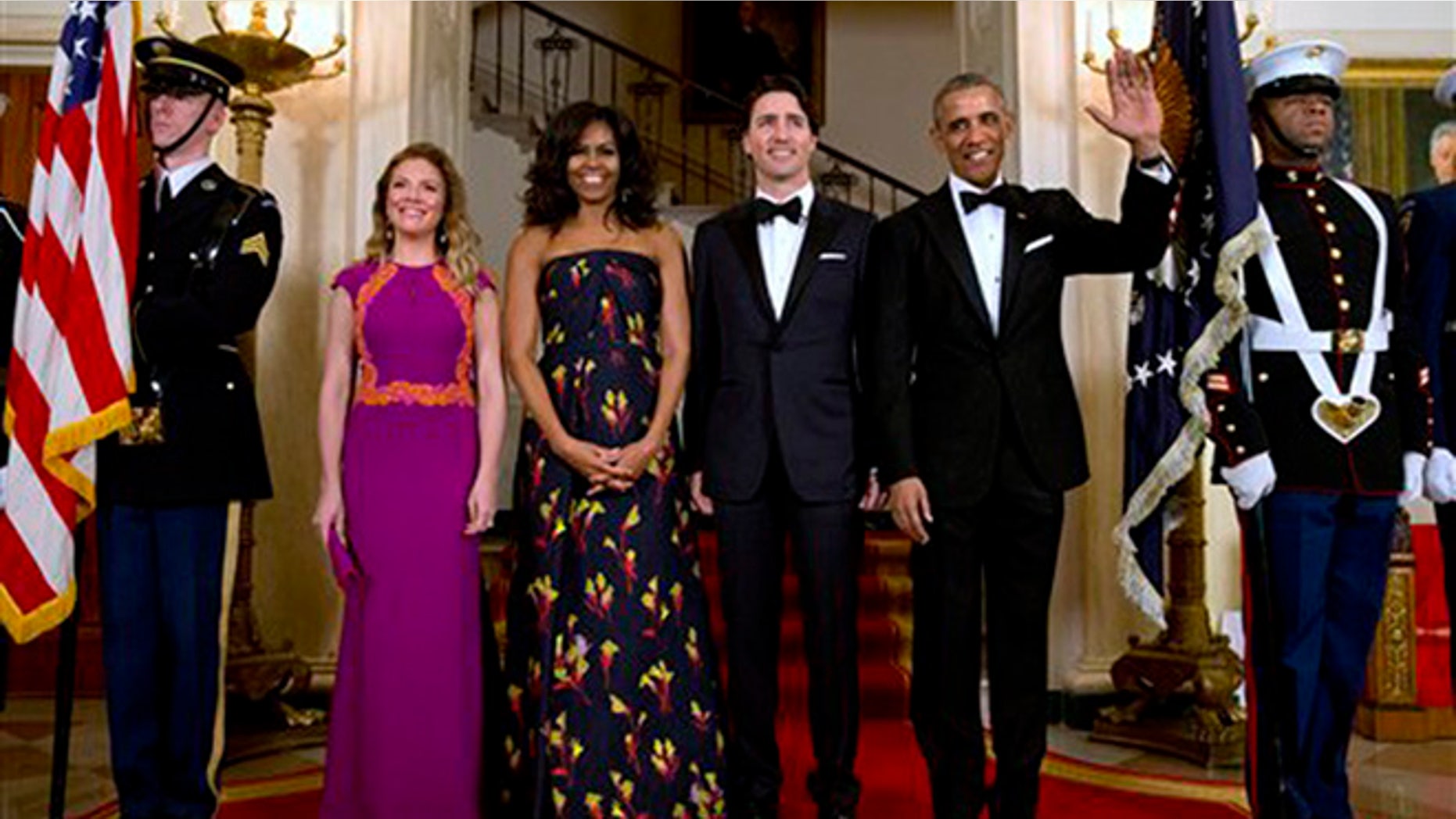 President Barack Obama, right, waves with from left, Sophie Grégoire Trudeau, first lady Michelle Obama, and Canadian Prime Minister Justin Trudeau, as they pose for a photograph at the White House during the State Dinner in Washington, Thursday, March 10, 2016. (AP Photo/Jacquelyn Martin)