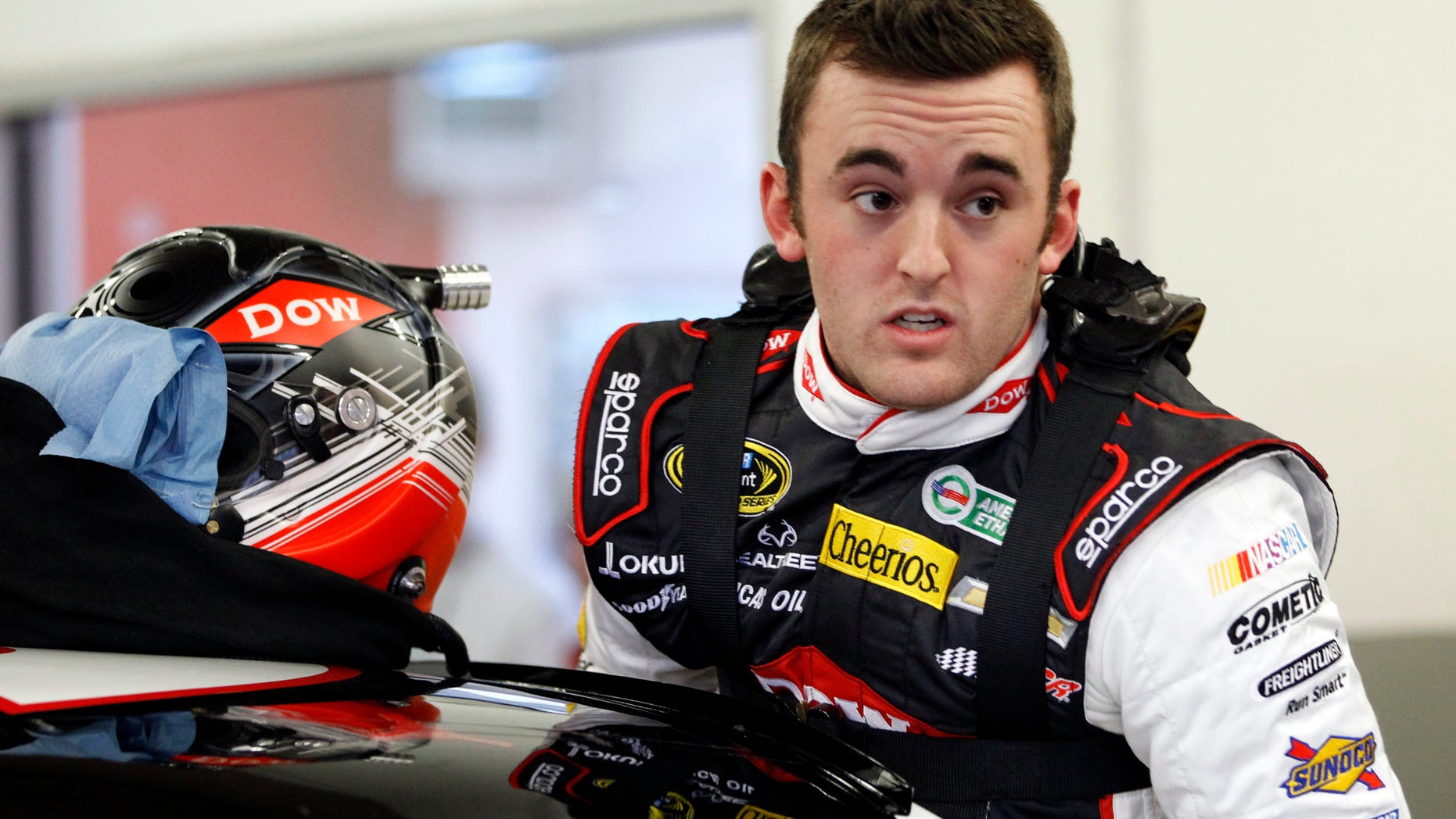 Austin Dillon climbs into his car before practice for Sunday's NASCAR Daytona 500 Sprint Cup Series auto race at Daytona International Speedway in Daytona Beach, Fla., Wednesday, Feb. 19, 2014. (AP Photo/Terry Renna)