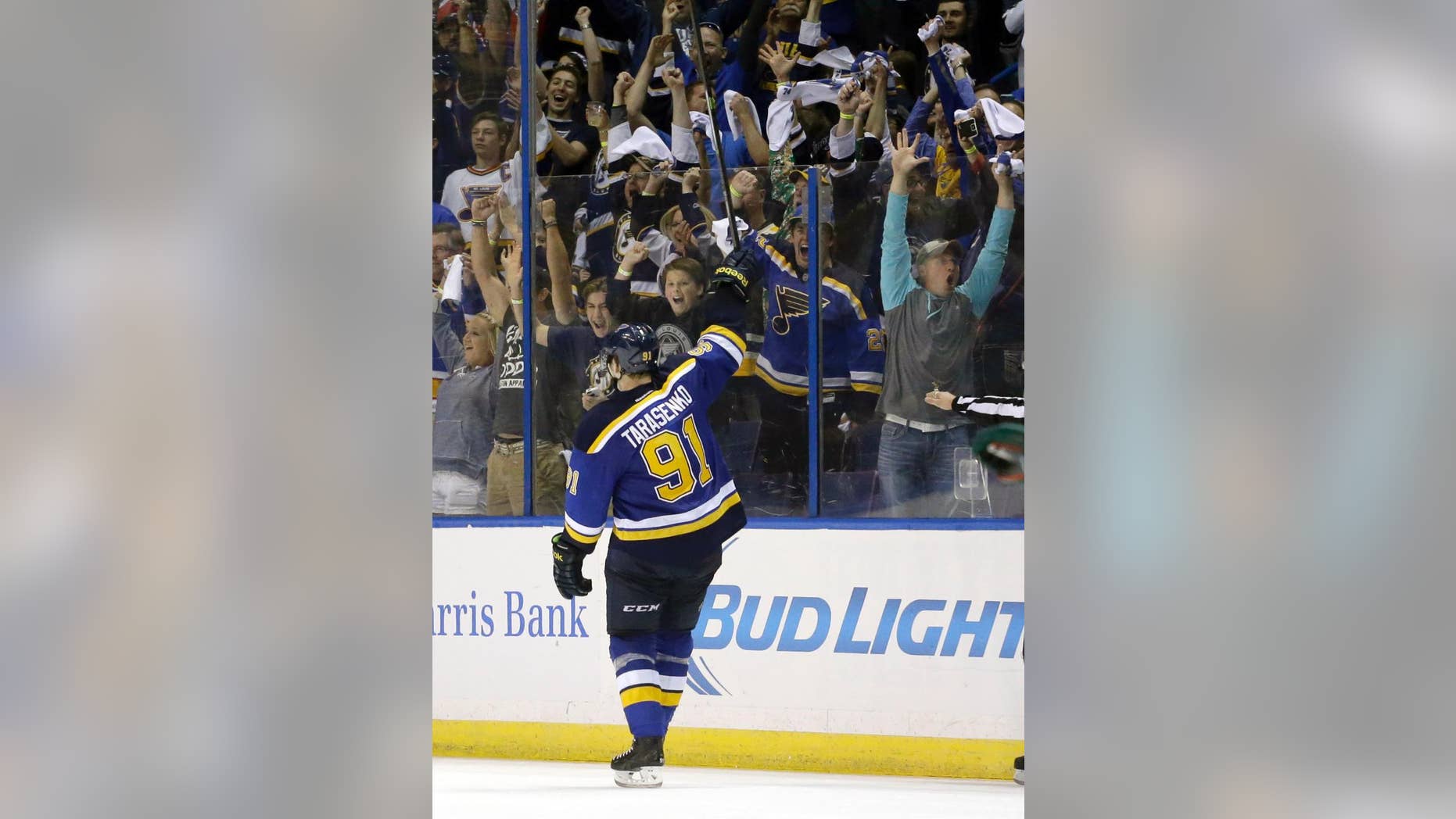 St. Louis Blues' Vladimir Tarasenko, of Russia, acknowledges the crowd after scoring his third goal of the game during the third period in Game 2 of an NHL hockey first-round playoff series against the Minnesota Wild, Saturday, April 18, 2015, in St. Louis. The Blues won 4-1 to tie the series 1-1. (AP Photo/Jeff Roberson)