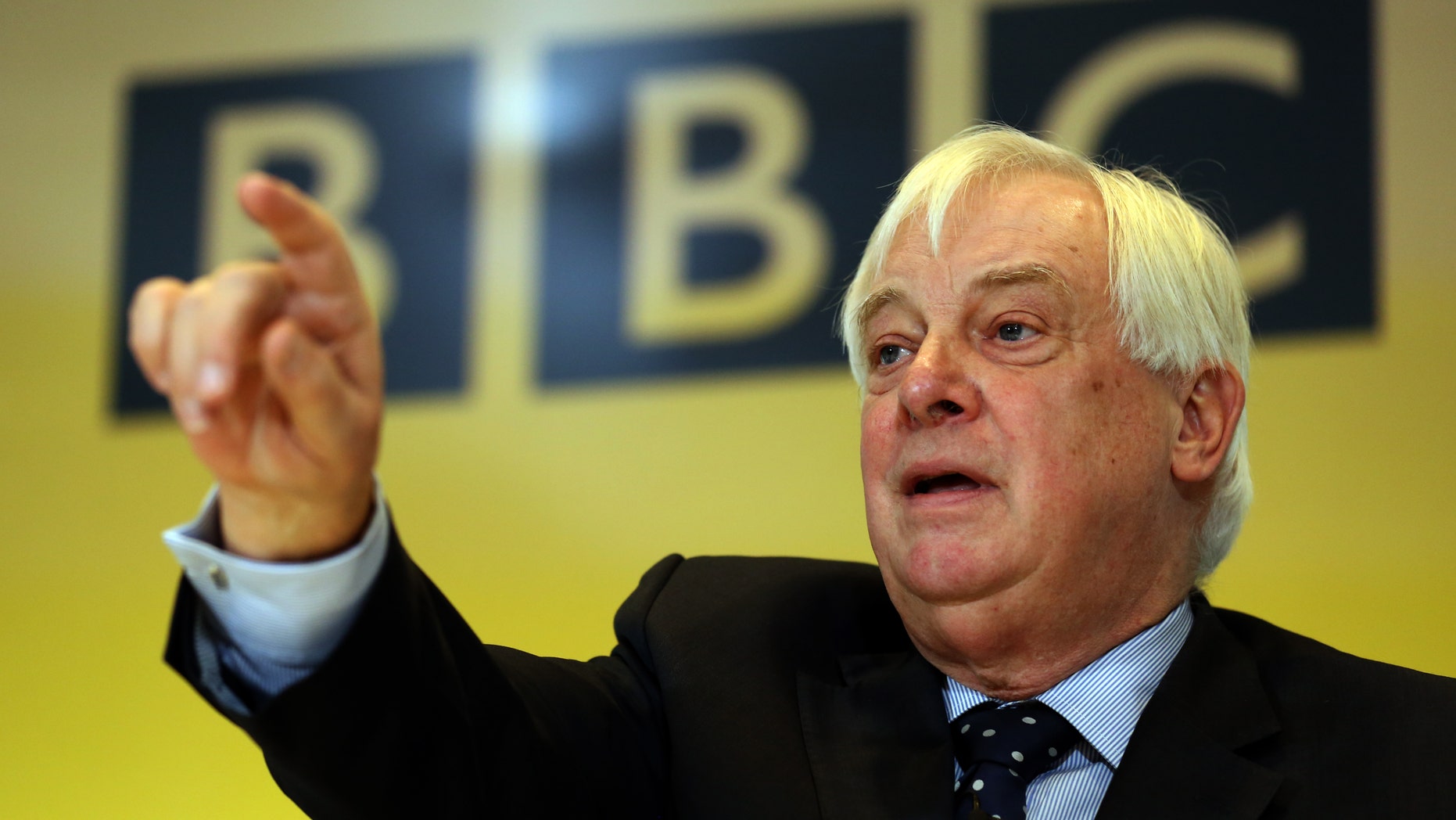 CORRECTS SPELLING OF SECOND NAME BBC Trust Chairman Lord Patten speaks during a press conference in response to The Pollard Report at New Broadcasting House, Portland Place, London Wednesday Dec. 19, 2012. Institutional chaos and confusion, but not a cover-up, were to blame for the BBC's disastrous handling of pedophilia allegations involving one of its best-known children's television personalities, an internal review found Wednesday. The review, carried out by former Sky News boss Nick Pollard, absolved BBC executives of trying to bury a potentially embarrassing story, saying that weak management and poor leadership were to blame for the fact that a planned expose about the late TV star, Jimmy Savile, never aired on the flagship "Newsnight" program. (AP Photo/Chris Radburn/Pool)