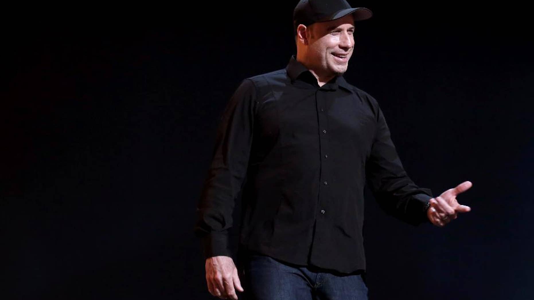 John Travolta is seen onstage during rehearsals for the 86th Academy Awards in Los Angeles, Saturday, March 1, 2014. The Academy Awards will be held at the Dolby Theatre on Sunday, March 2. (Photo by Matt Sayles/Invision/AP)